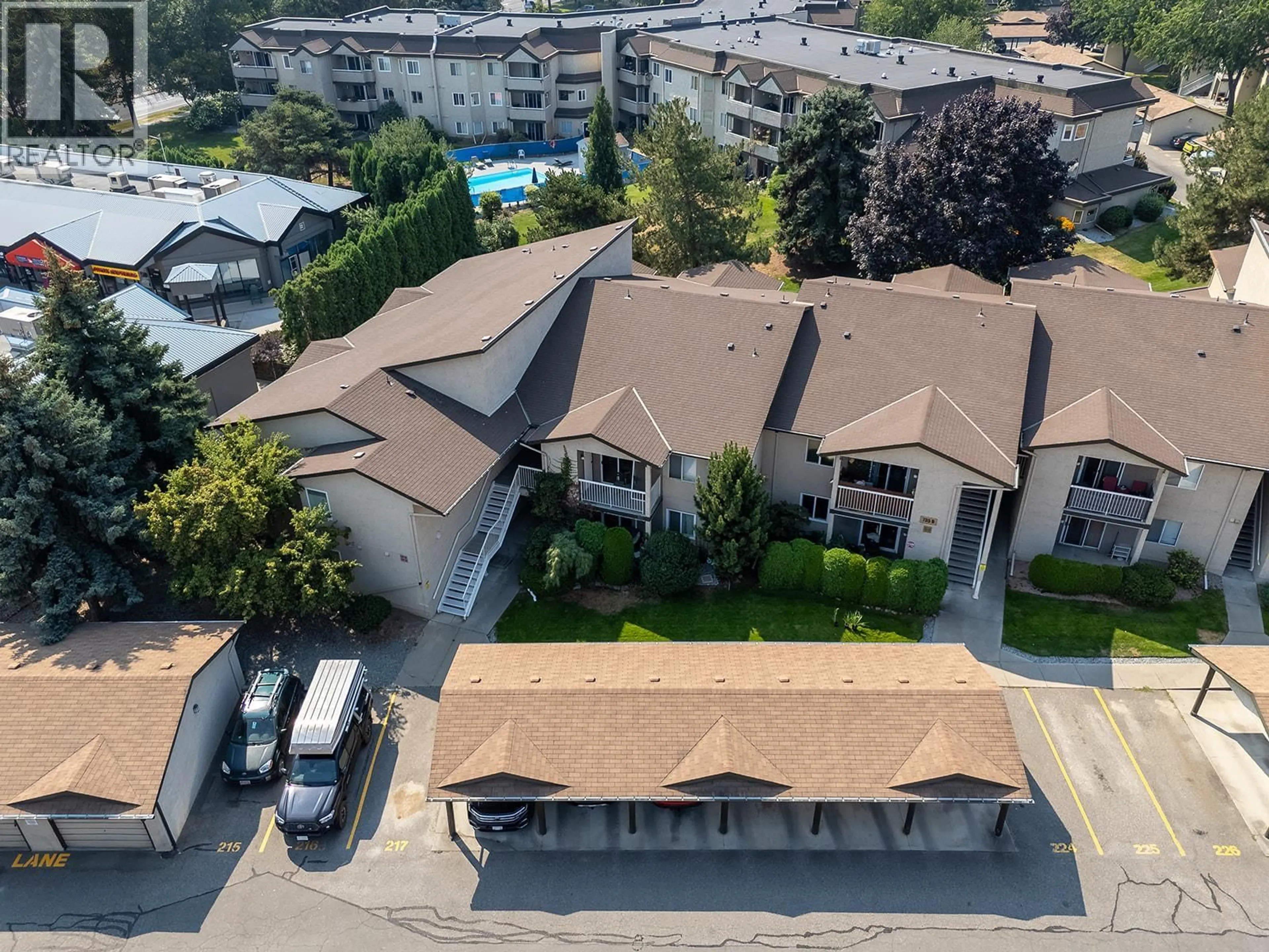 A pic from outside/outdoor area/front of a property/back of a property/a pic from drone, city buildings view from balcony for 208D - 735 COOK ROAD, Kelowna British Columbia V1W3G6