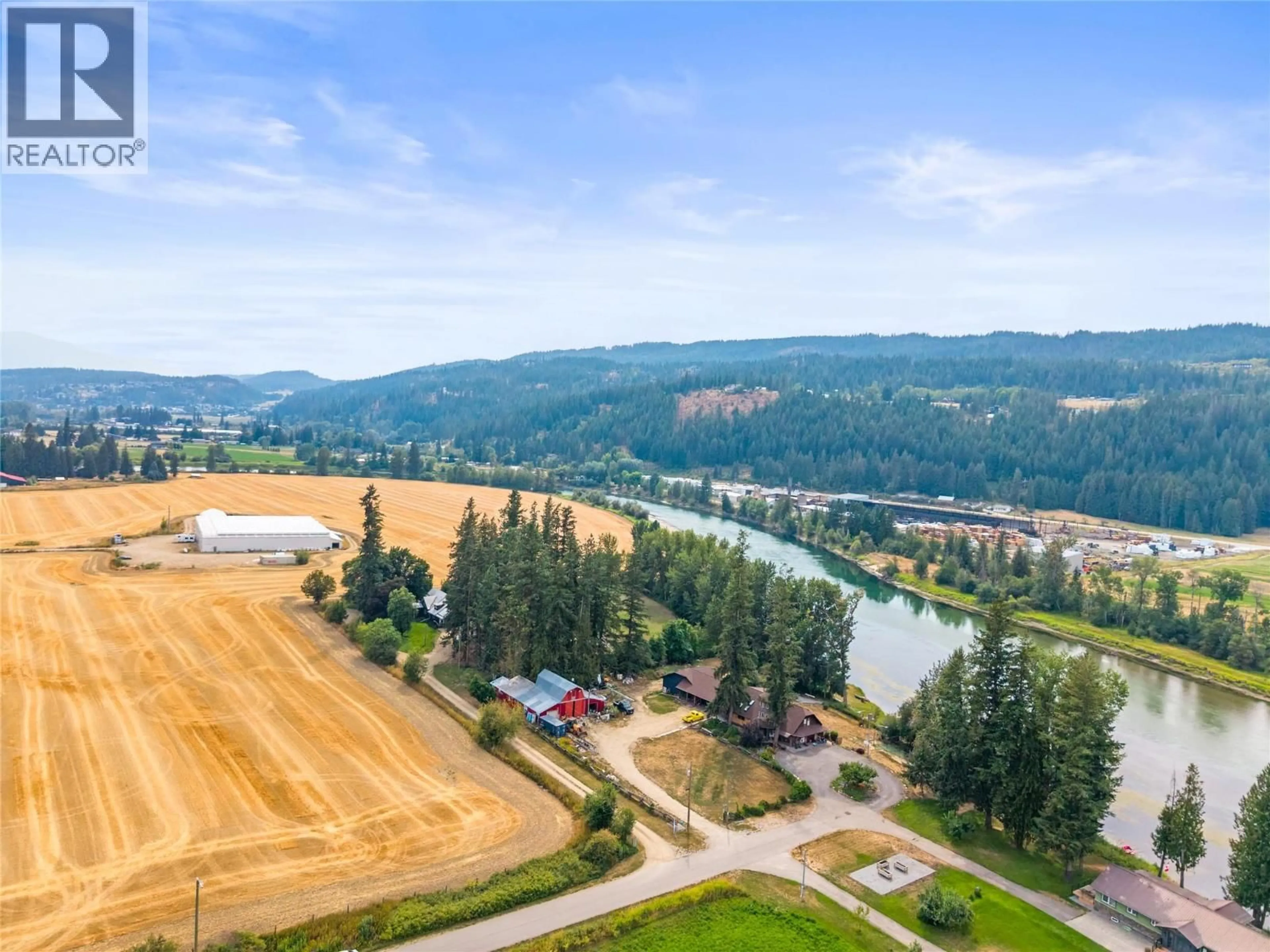 A pic from outside/outdoor area/front of a property/back of a property/a pic from drone, water/lake/river/ocean view for 218 ANDERSON ROAD, Enderby British Columbia V0E1V4