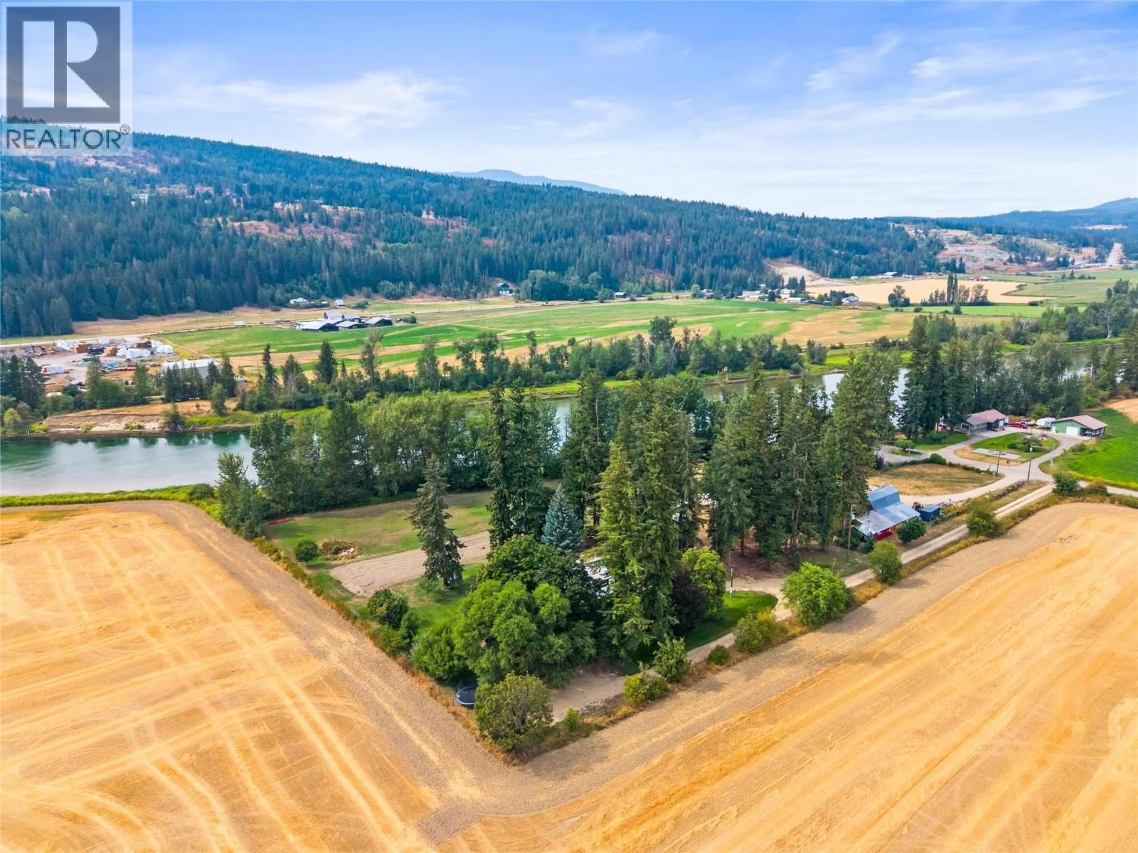 A pic from outside/outdoor area/front of a property/back of a property/a pic from drone, water/lake/river/ocean view for 218 ANDERSON ROAD, Enderby British Columbia V0E1V4