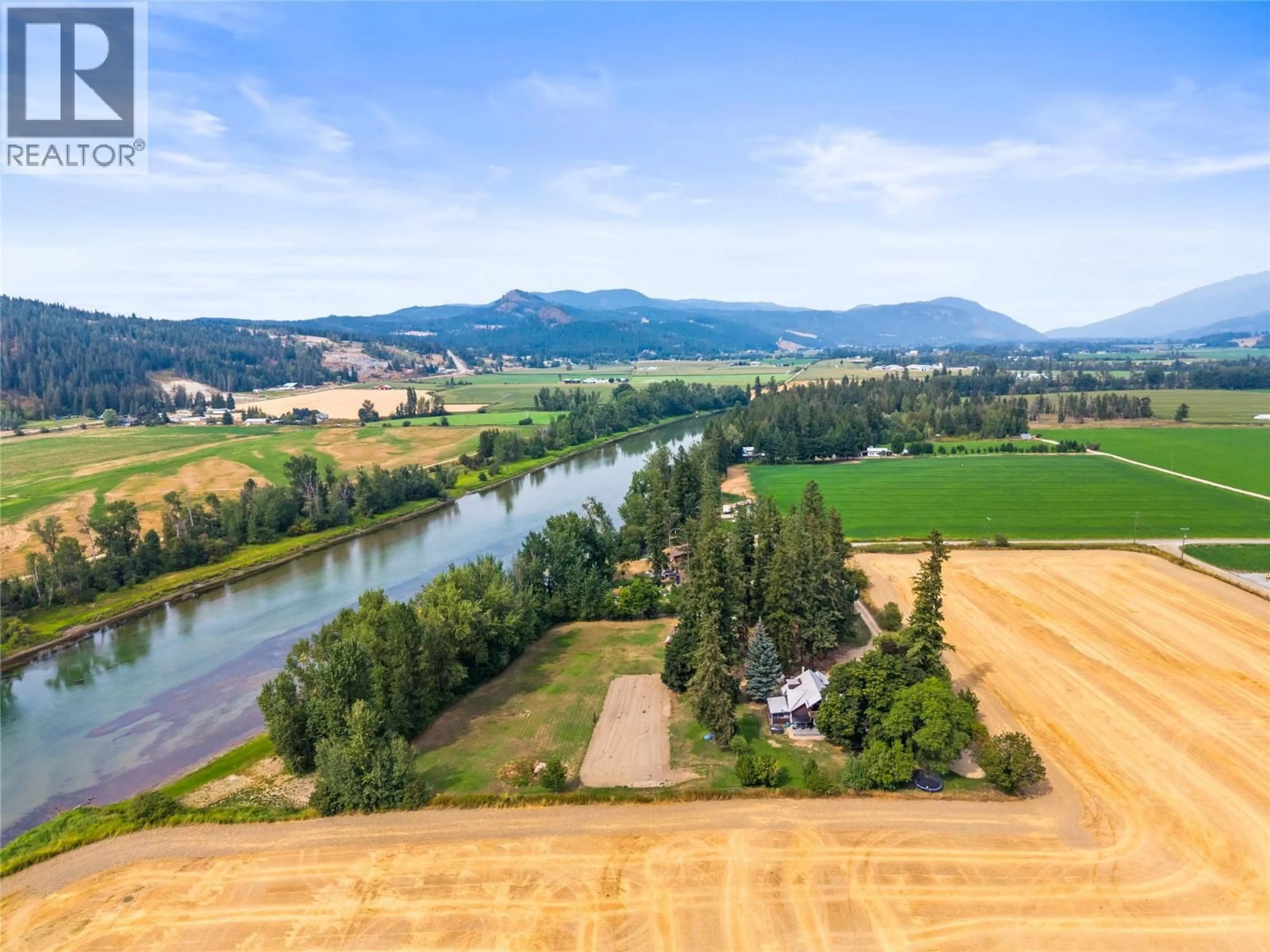 A pic from outside/outdoor area/front of a property/back of a property/a pic from drone, water/lake/river/ocean view for 218 ANDERSON ROAD, Enderby British Columbia V0E1V4