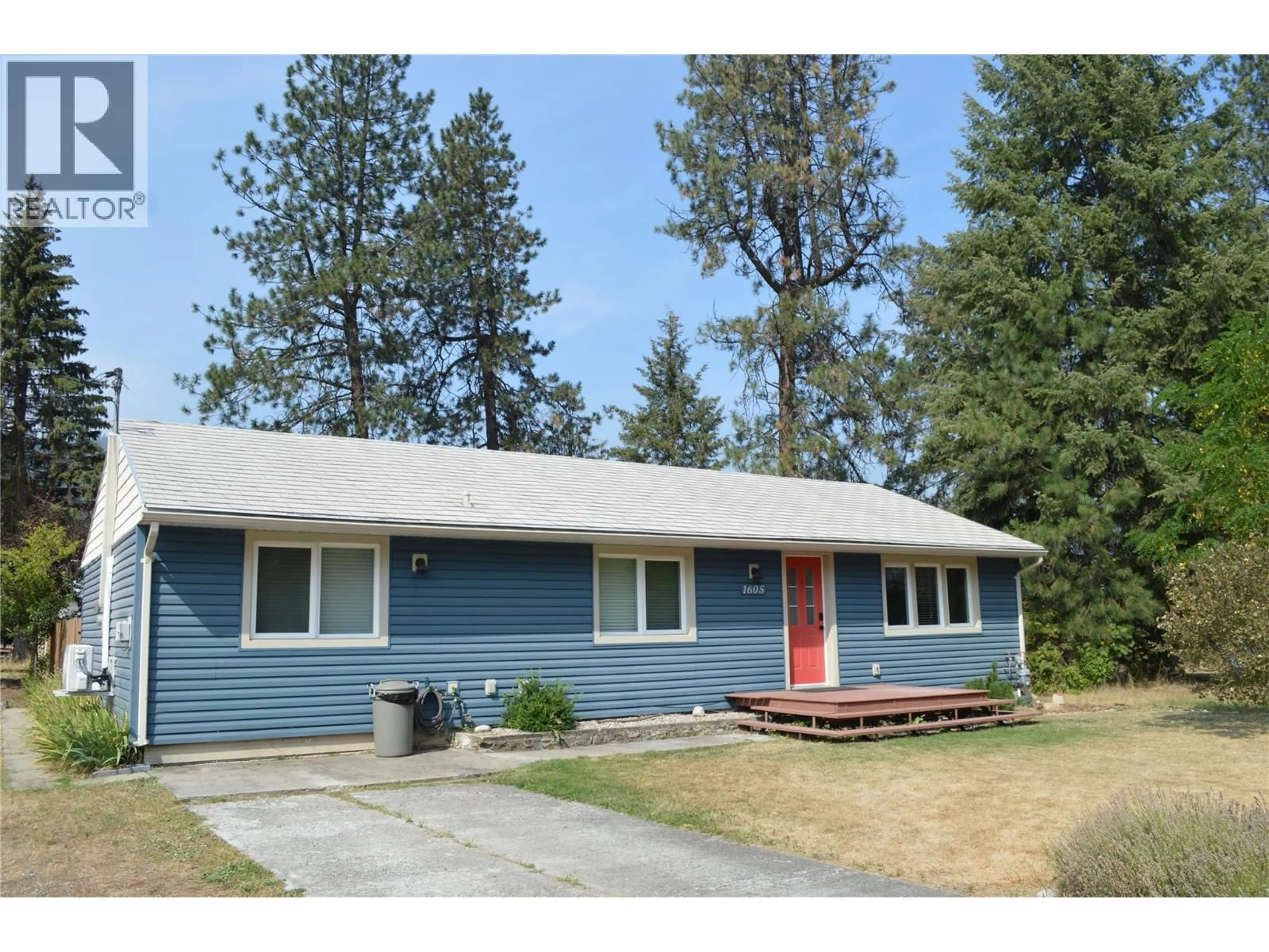 Home with vinyl exterior material, street for 1605 NEIMI ROAD, Christina Lake British Columbia V0H1E0