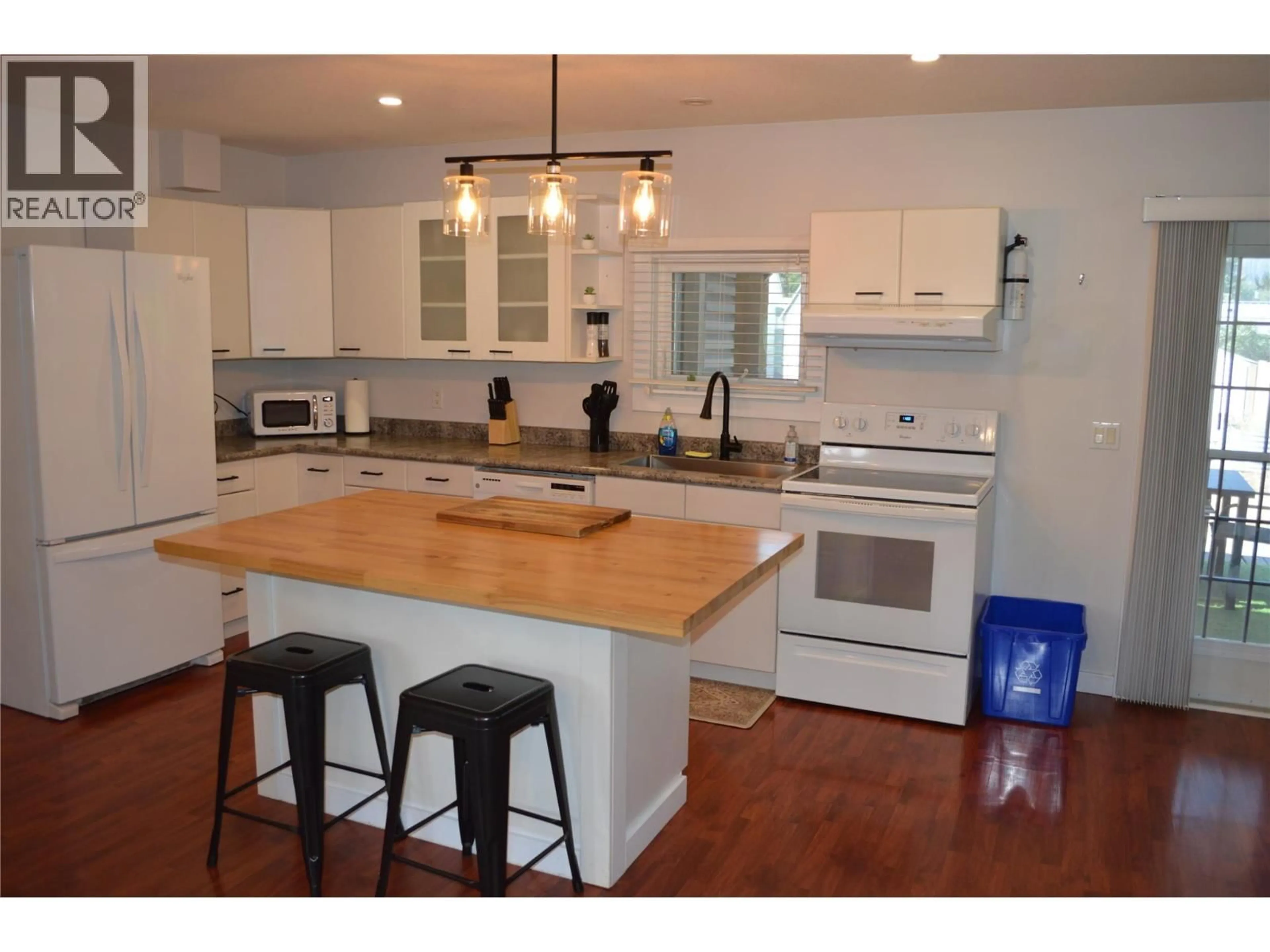 Open concept kitchen, wood/laminate floor for 1605 NEIMI ROAD, Christina Lake British Columbia V0H1E0
