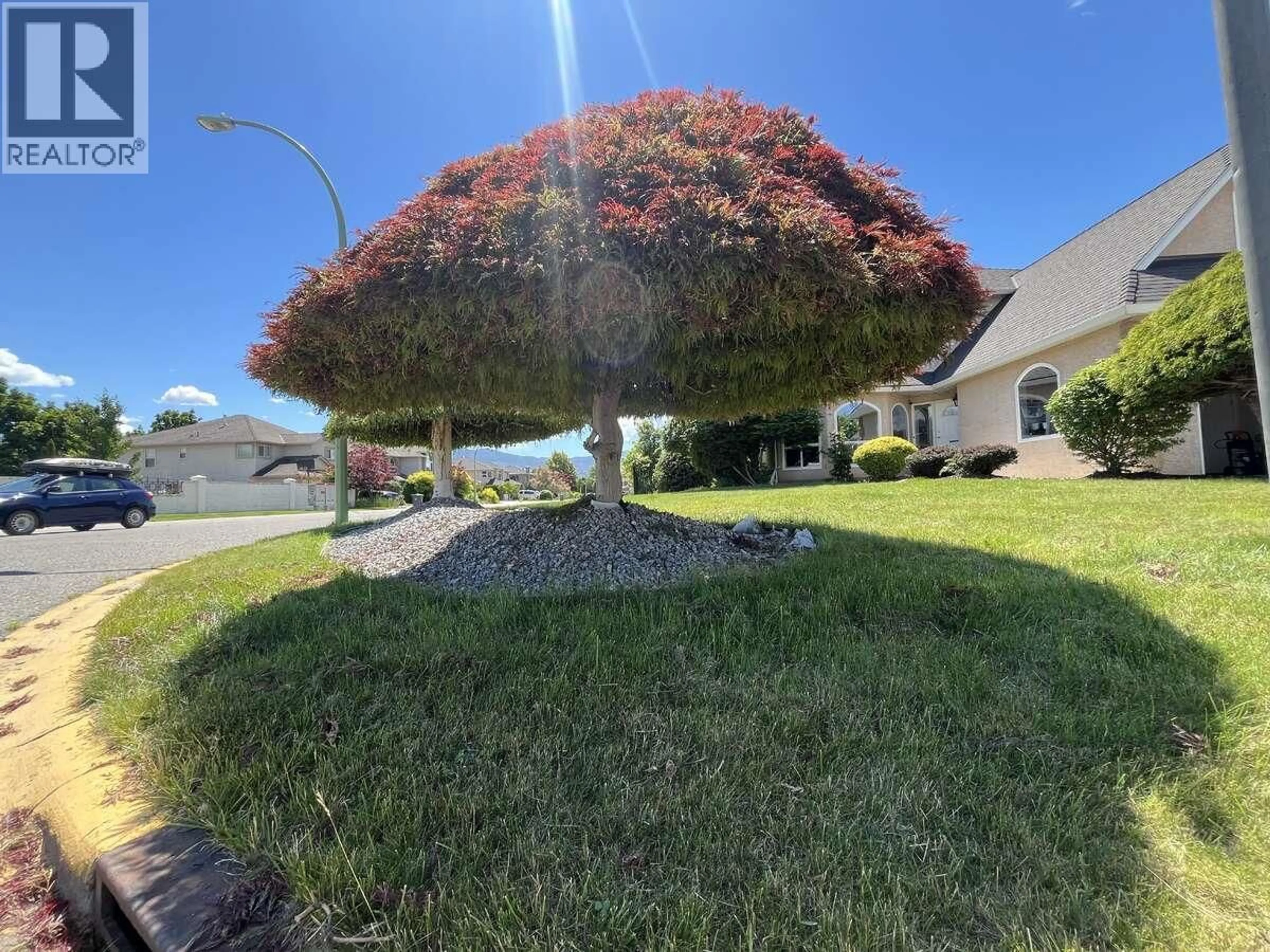 A pic from outside/outdoor area/front of a property/back of a property/a pic from drone, street for 877 SPRINGSIDE COURT, Kelowna British Columbia V1W3L8