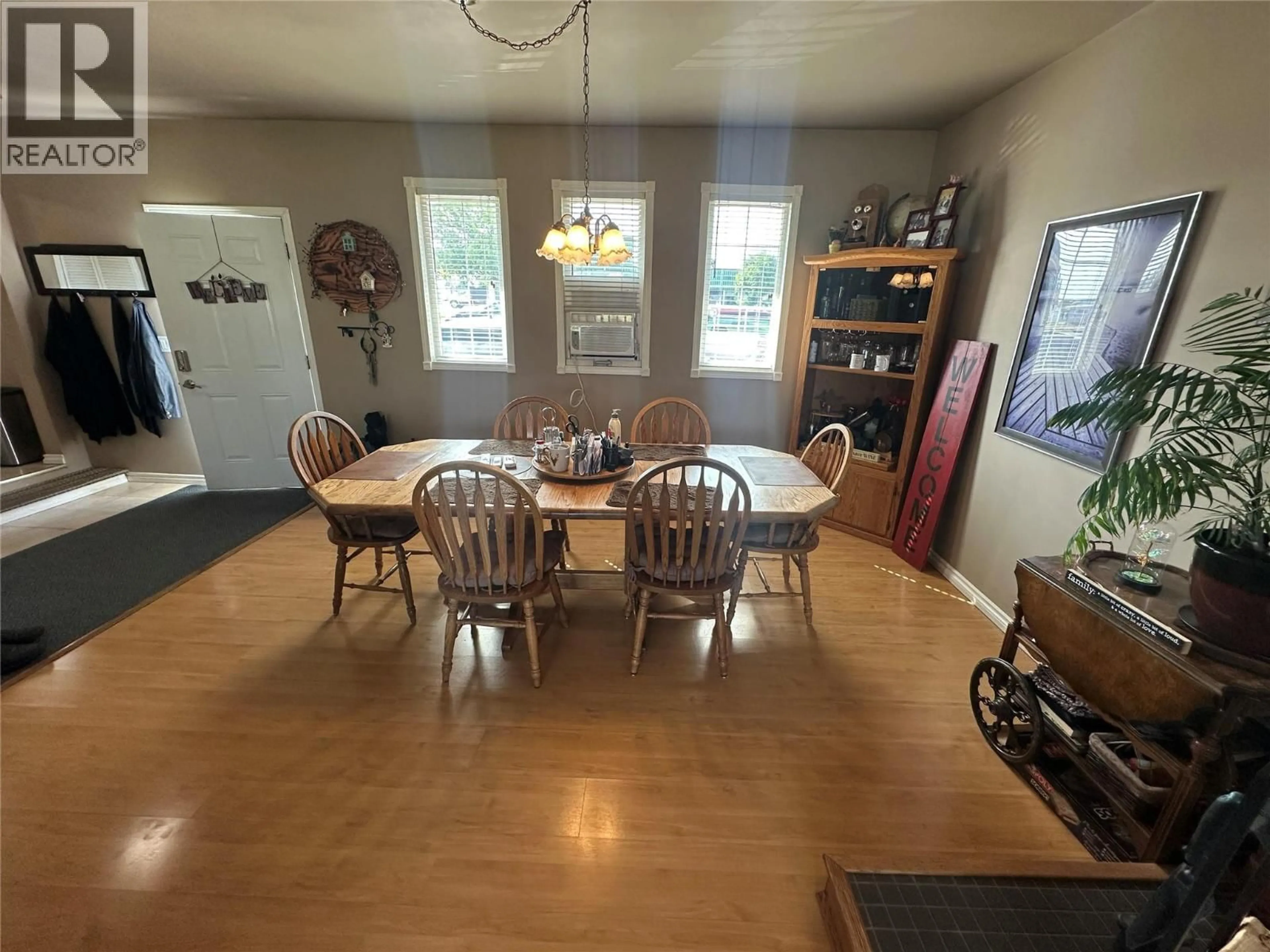 Dining room, wood/laminate floor for 11324 13A STREET, Dawson Creek British Columbia V1G3X7