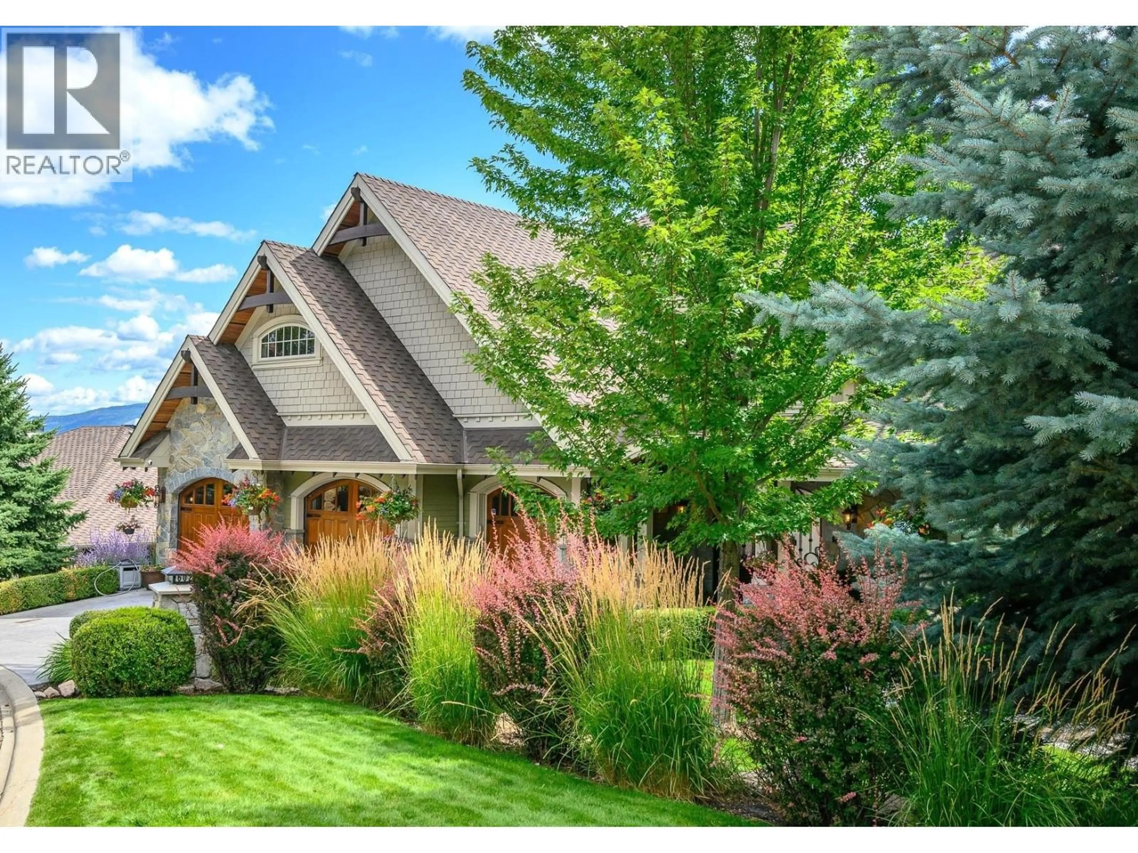 Home with brick exterior material, street for 602 FALCON POINT WAY, Vernon British Columbia V1H2H7