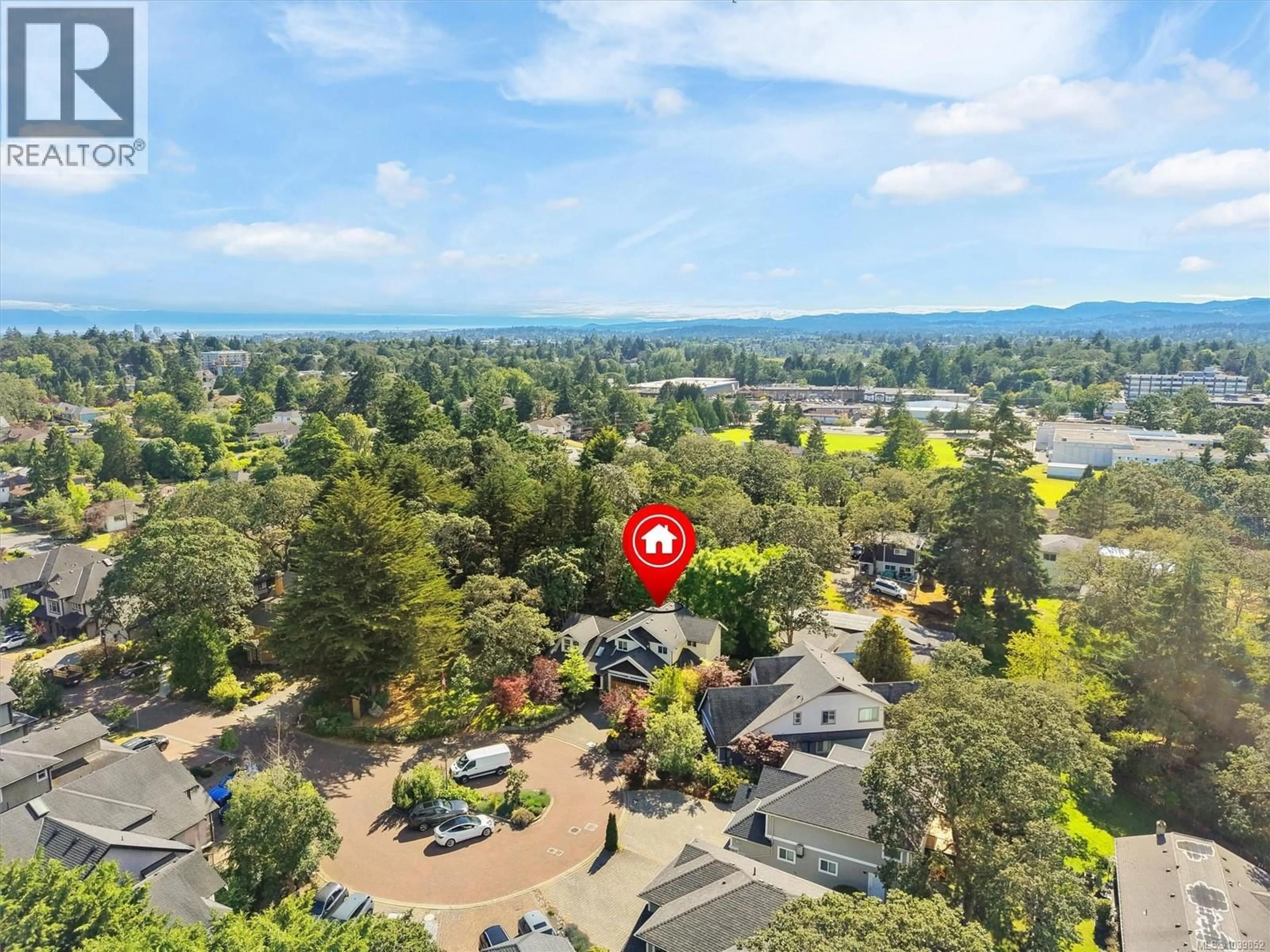 A pic from outside/outdoor area/front of a property/back of a property/a pic from drone, mountain view for 3962 STAN WRIGHT LANE, Saanich British Columbia V8P0A1