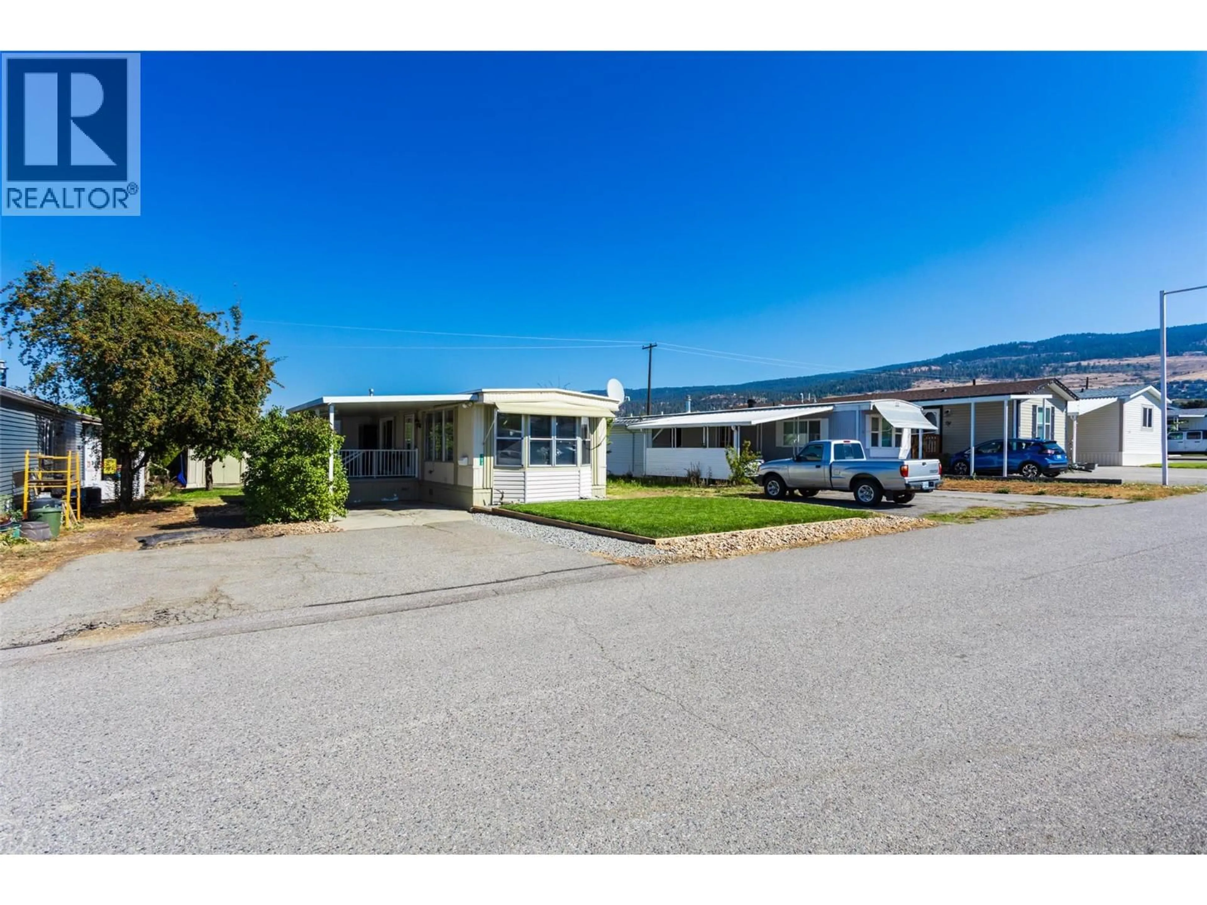 A pic from outside/outdoor area/front of a property/back of a property/a pic from drone, unknown for 108 - 3591 OLD VERNON ROAD, Kelowna British Columbia V1X6P4