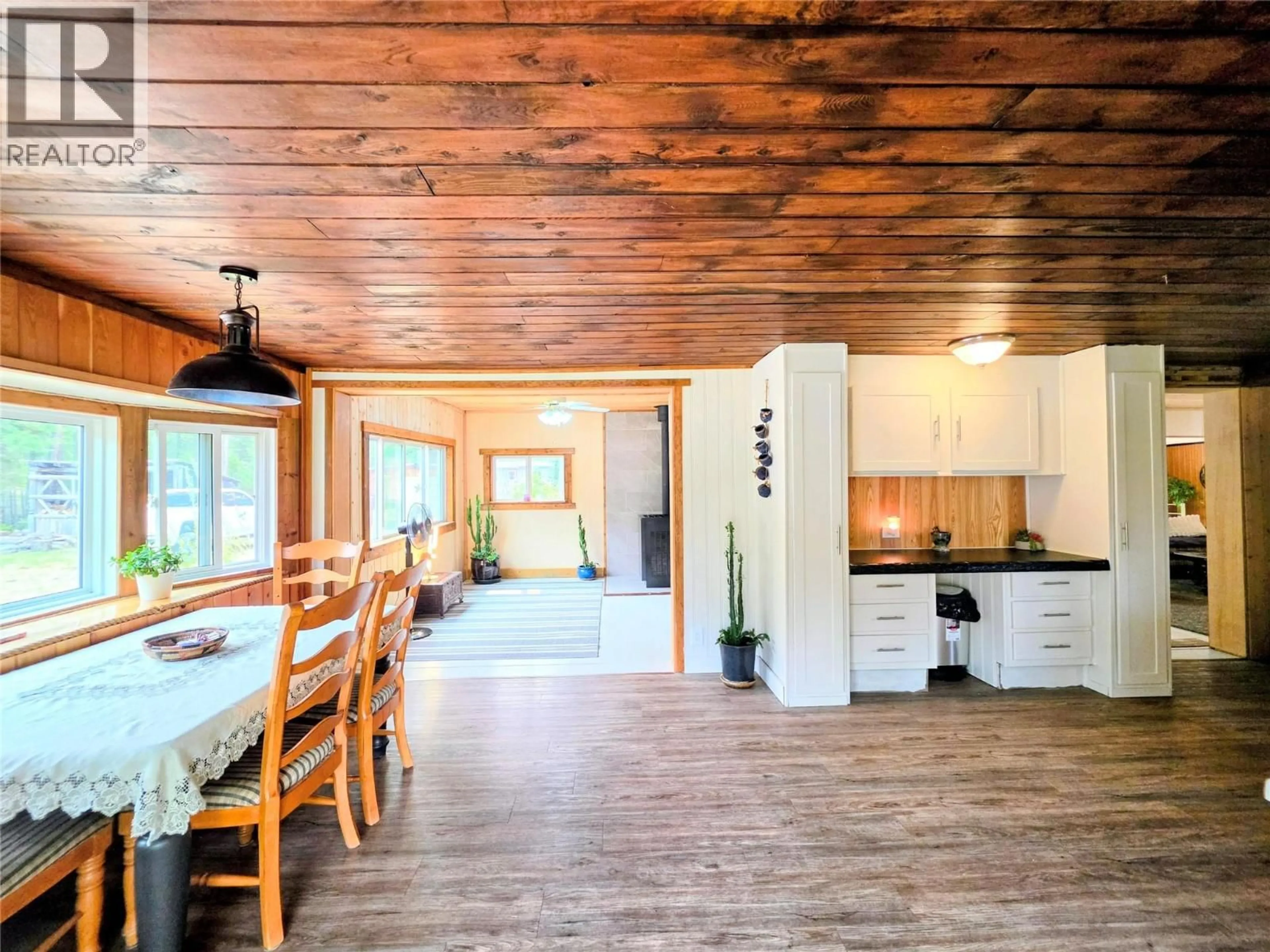 Open concept kitchen, wood/laminate floor for 8309 ROCK CREEK ROAD, Galloway British Columbia V0B1T2
