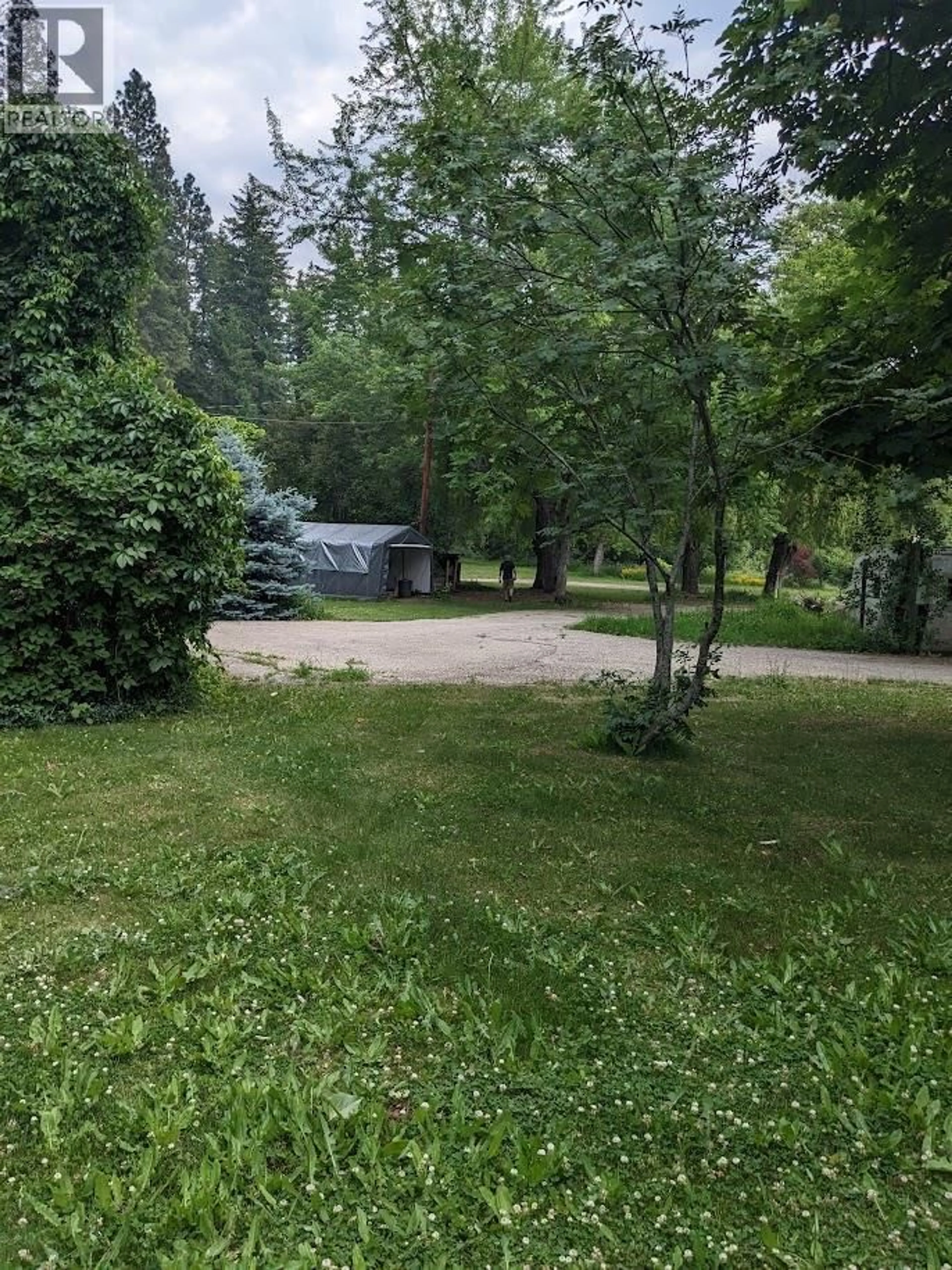 A pic from outside/outdoor area/front of a property/back of a property/a pic from drone, forest/trees view for 3311 COLTON ROAD, Tappen British Columbia V0E2X1
