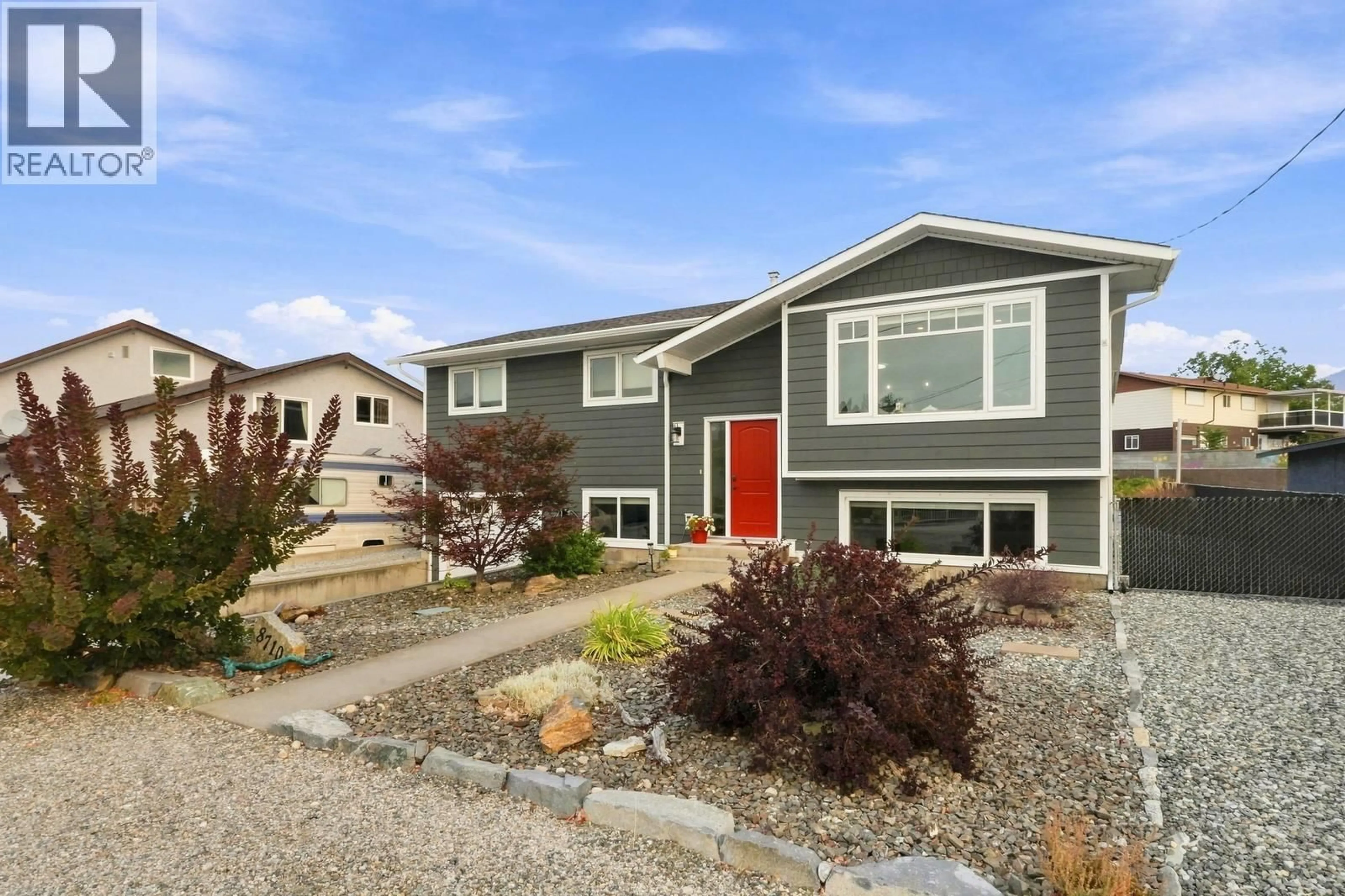 Home with vinyl exterior material, street for 8710 JUBILEE DRIVE, Osoyoos British Columbia V0H1V2