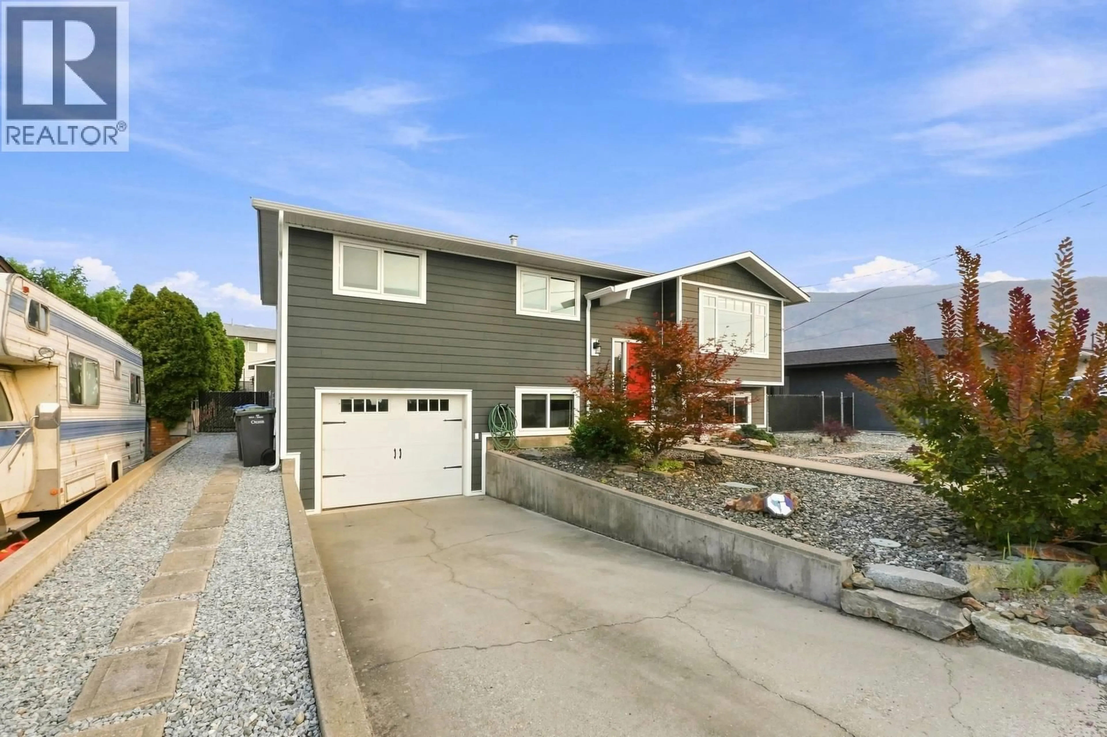 Home with vinyl exterior material, street for 8710 JUBILEE DRIVE, Osoyoos British Columbia V0H1V2