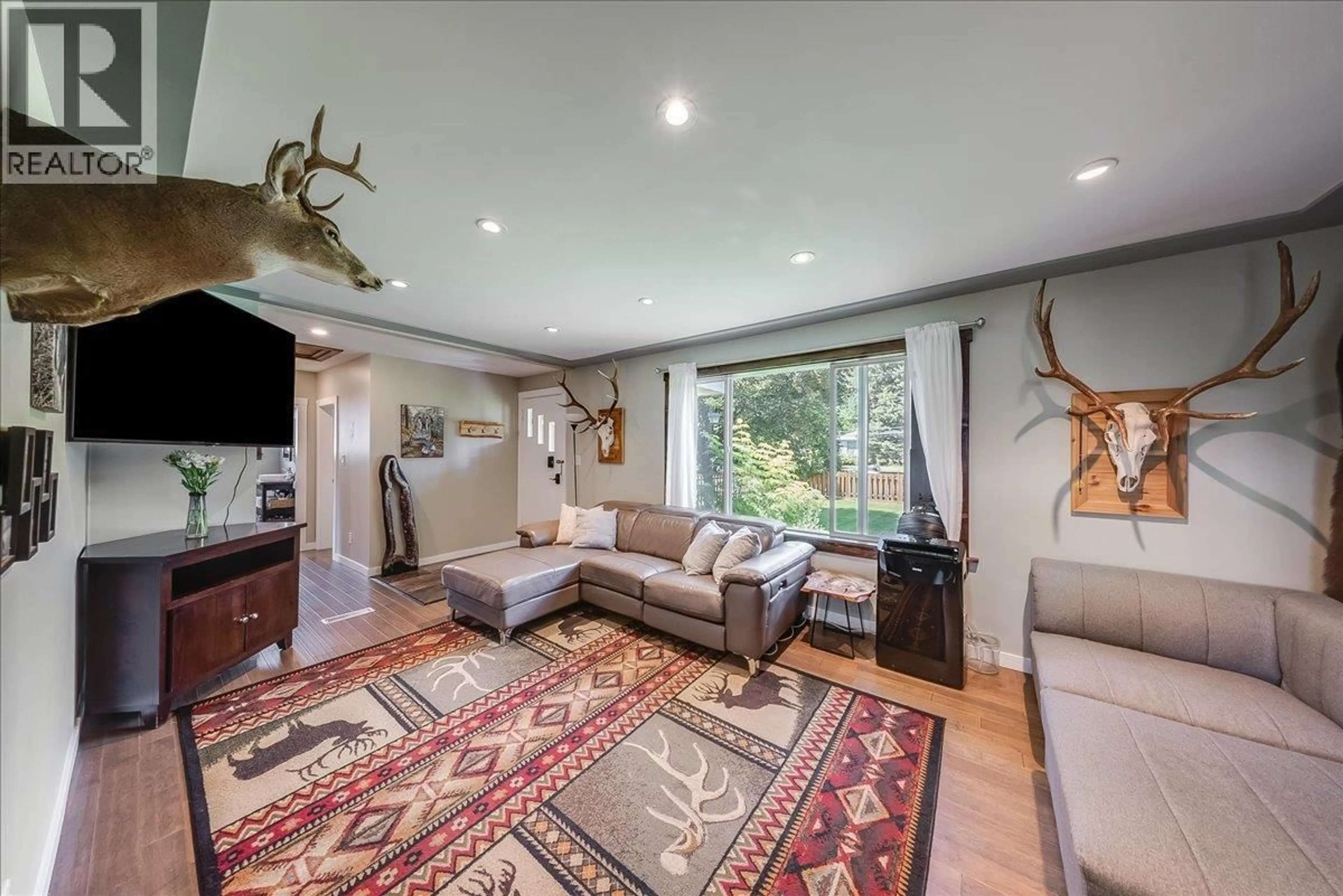 Living room with furniture, unknown for 526 12TH AVENUE, Genelle British Columbia V0G1G0