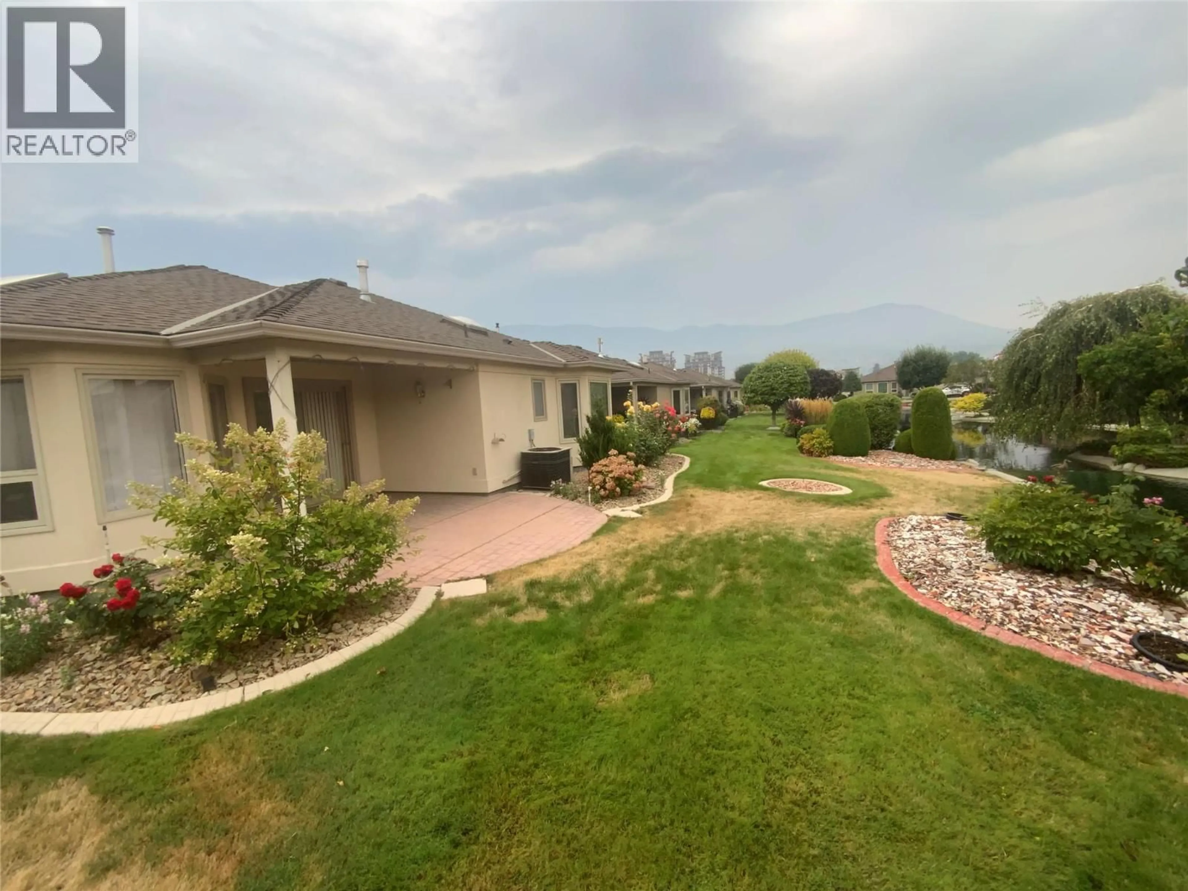 A pic from outside/outdoor area/front of a property/back of a property/a pic from drone, water/lake/river/ocean view for 878 - 3333 SOUTH MAIN STREET, Penticton British Columbia V2A8J8