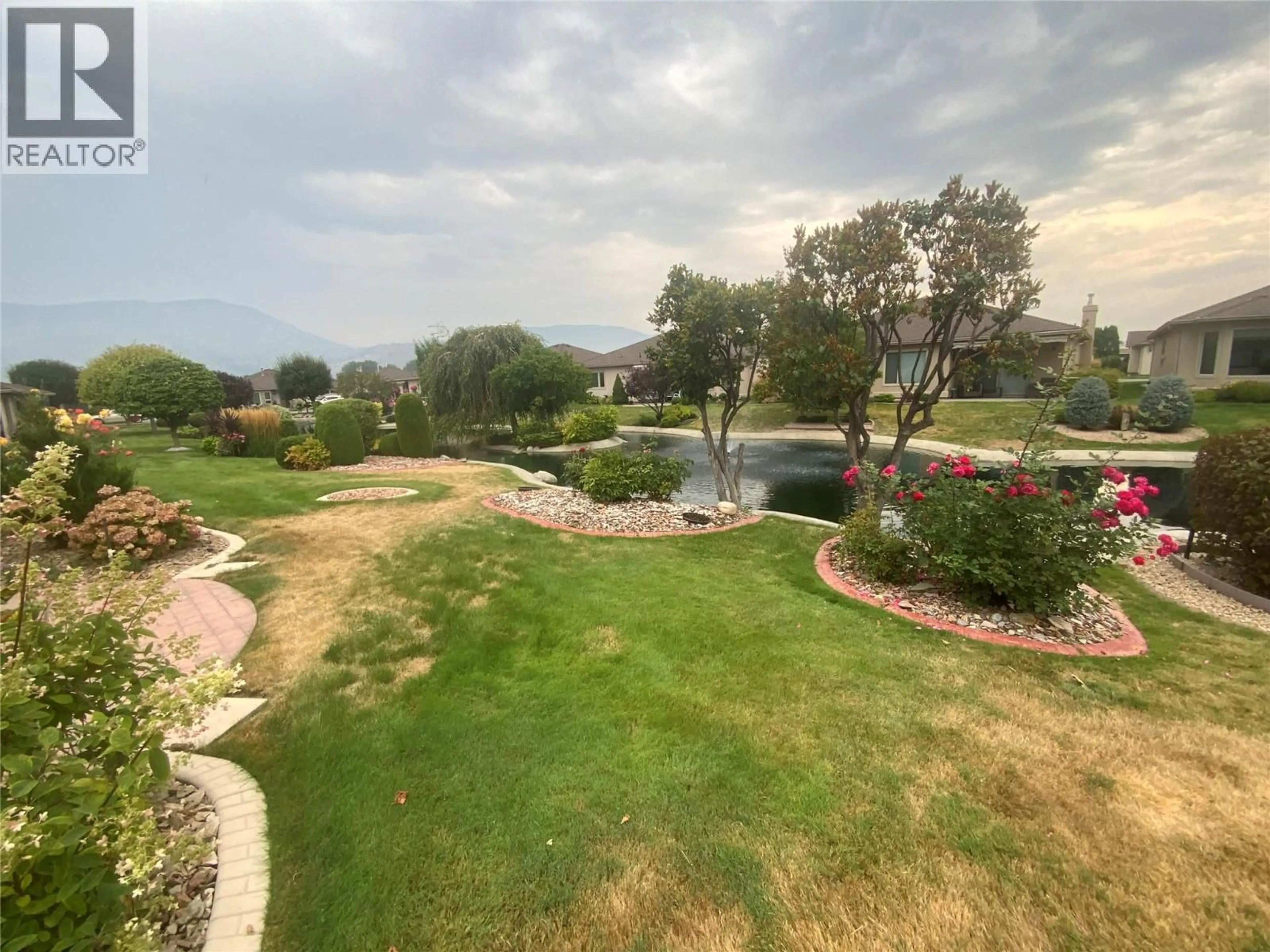 A pic from outside/outdoor area/front of a property/back of a property/a pic from drone, water/lake/river/ocean view for 878 - 3333 SOUTH MAIN STREET, Penticton British Columbia V2A8J8