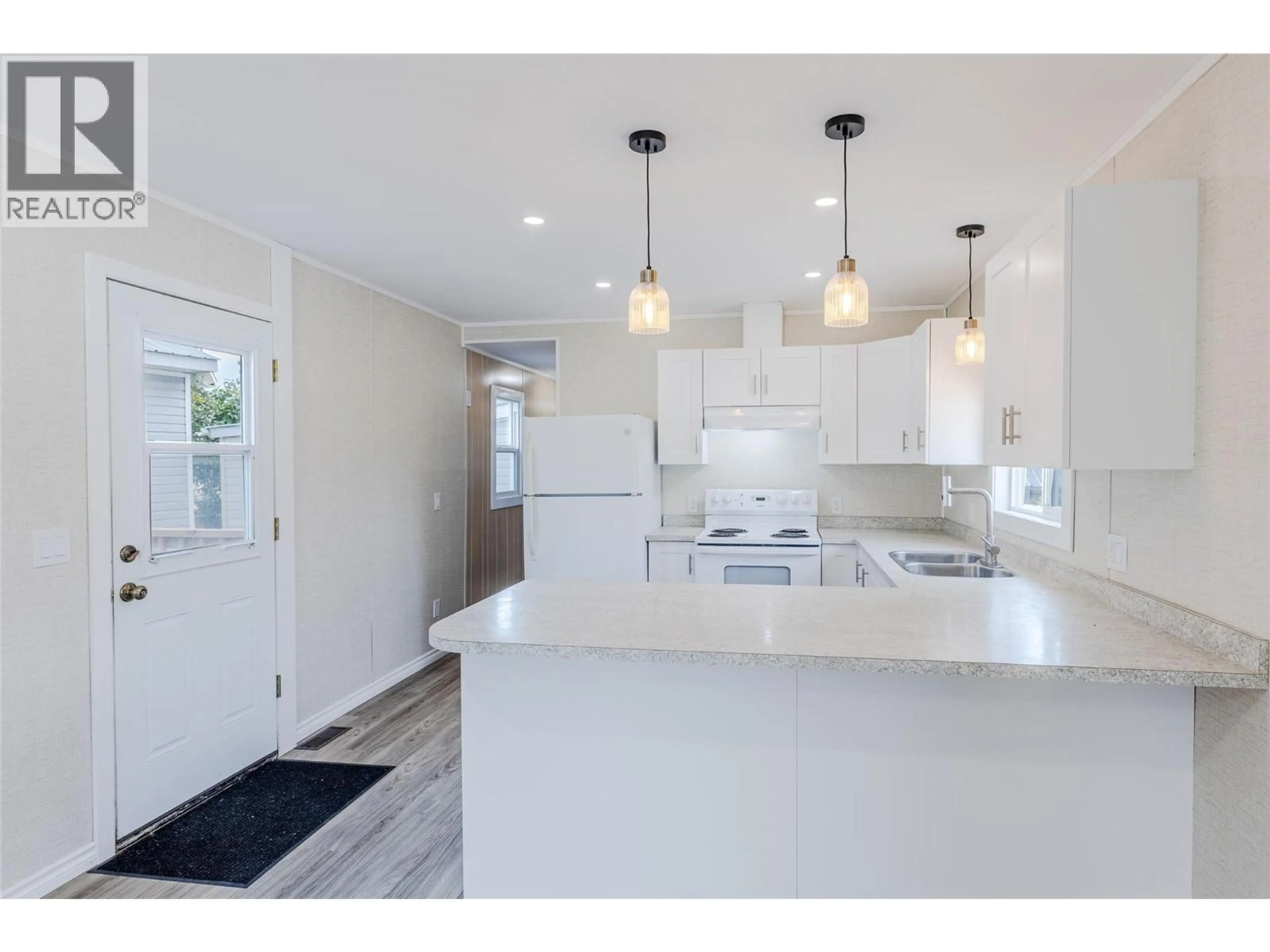 Open concept kitchen, unknown for 21 - 1421 ERICKSON ROAD, Creston British Columbia V0B1G1