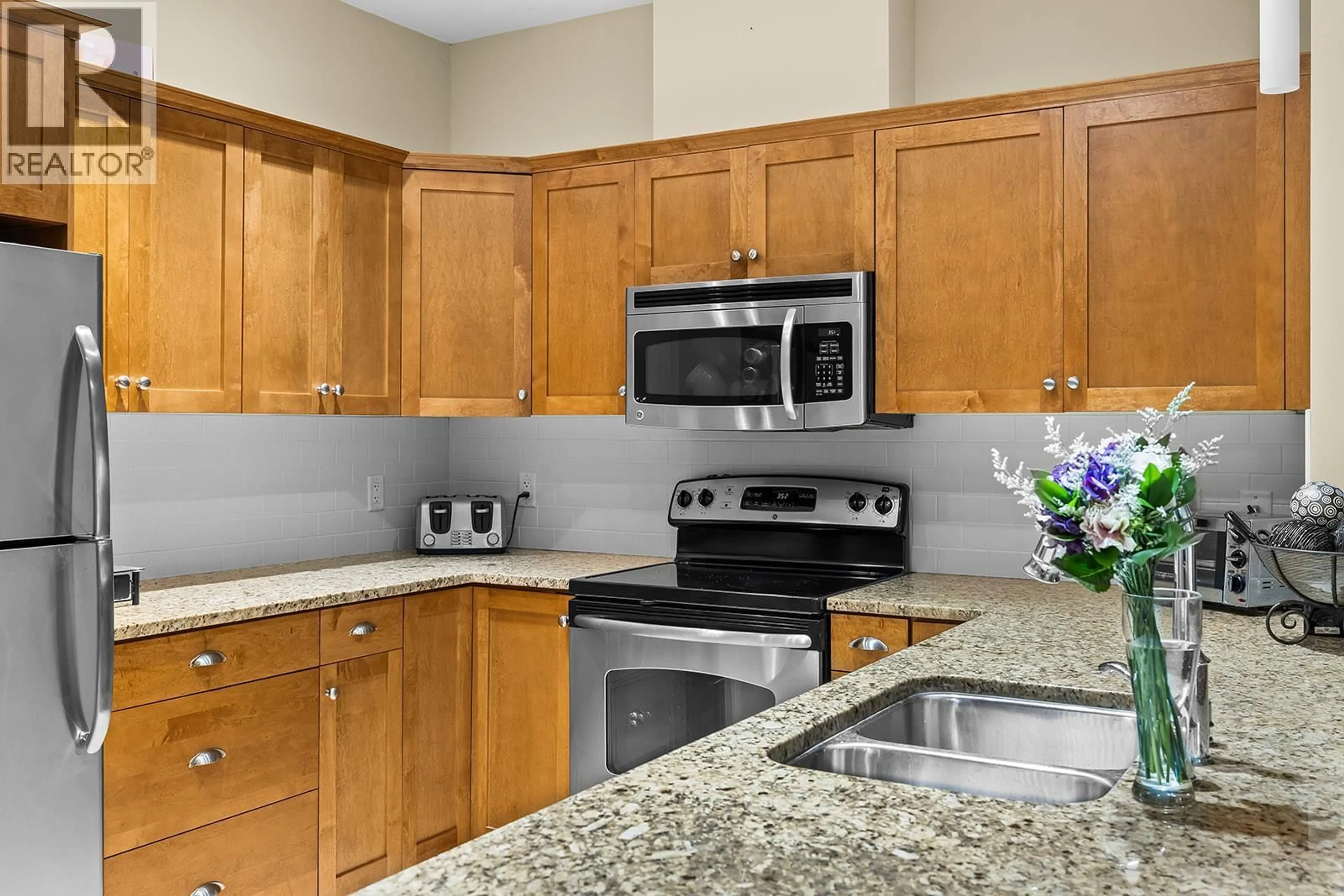 Standard kitchen, ceramic/tile floor for 3307 - 1990 UPPER SUNDANCE DRIVE, West Kelowna British Columbia V4T3E7