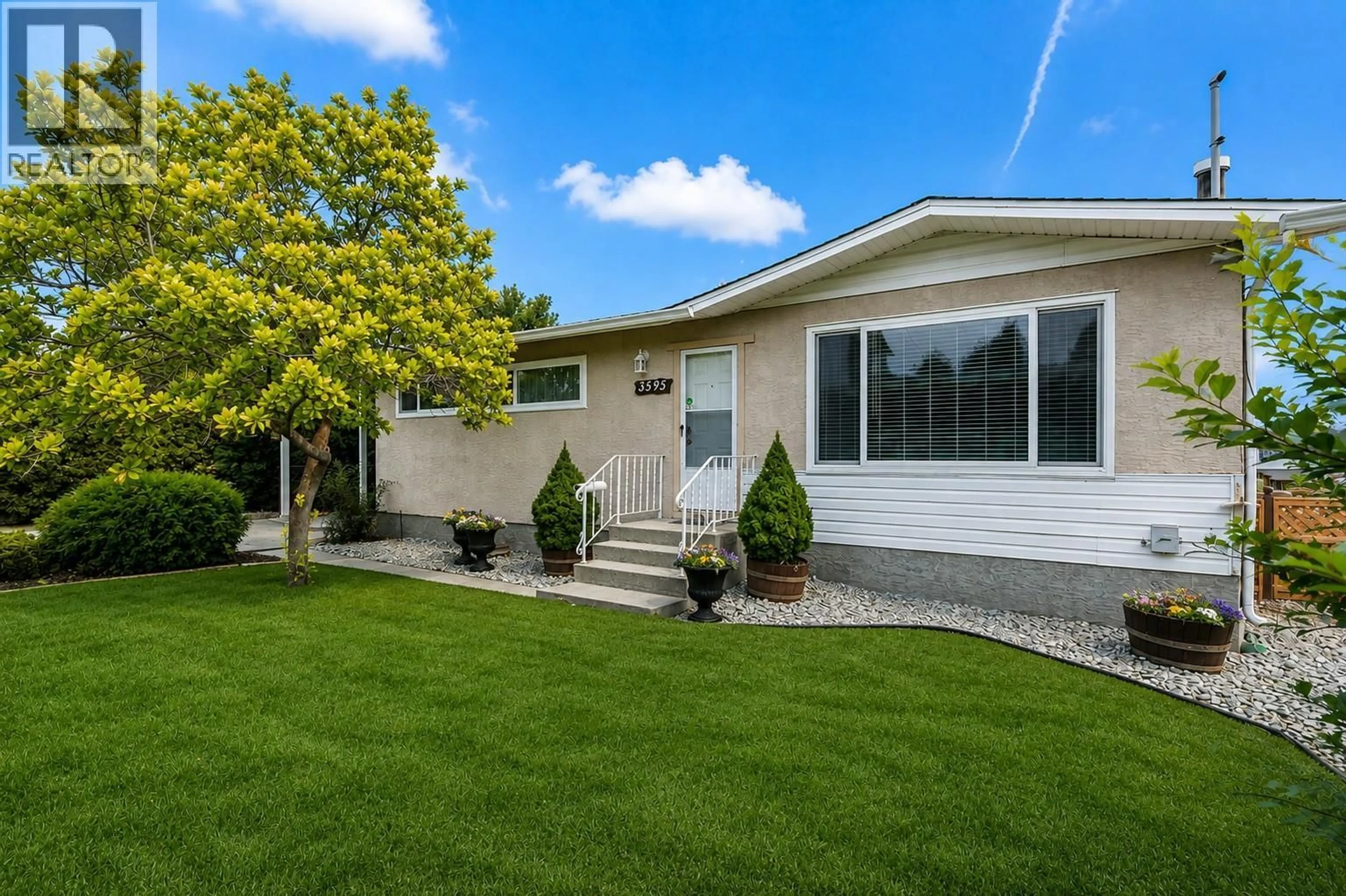 Home with vinyl exterior material, street for 3595 BROWN ROAD, West Kelowna British Columbia V4T1P5