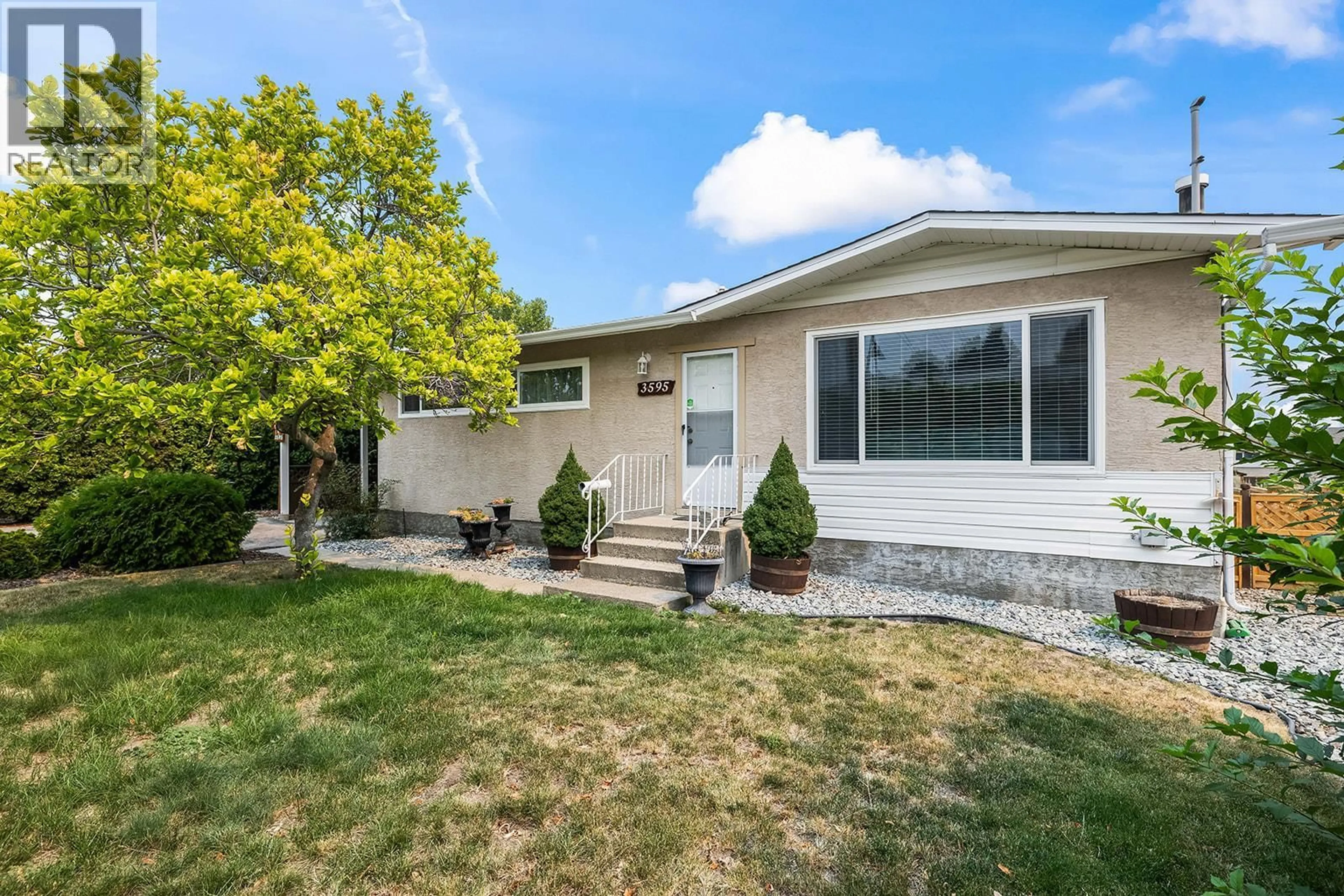 Home with vinyl exterior material, street for 3595 BROWN ROAD, West Kelowna British Columbia V4T1P5