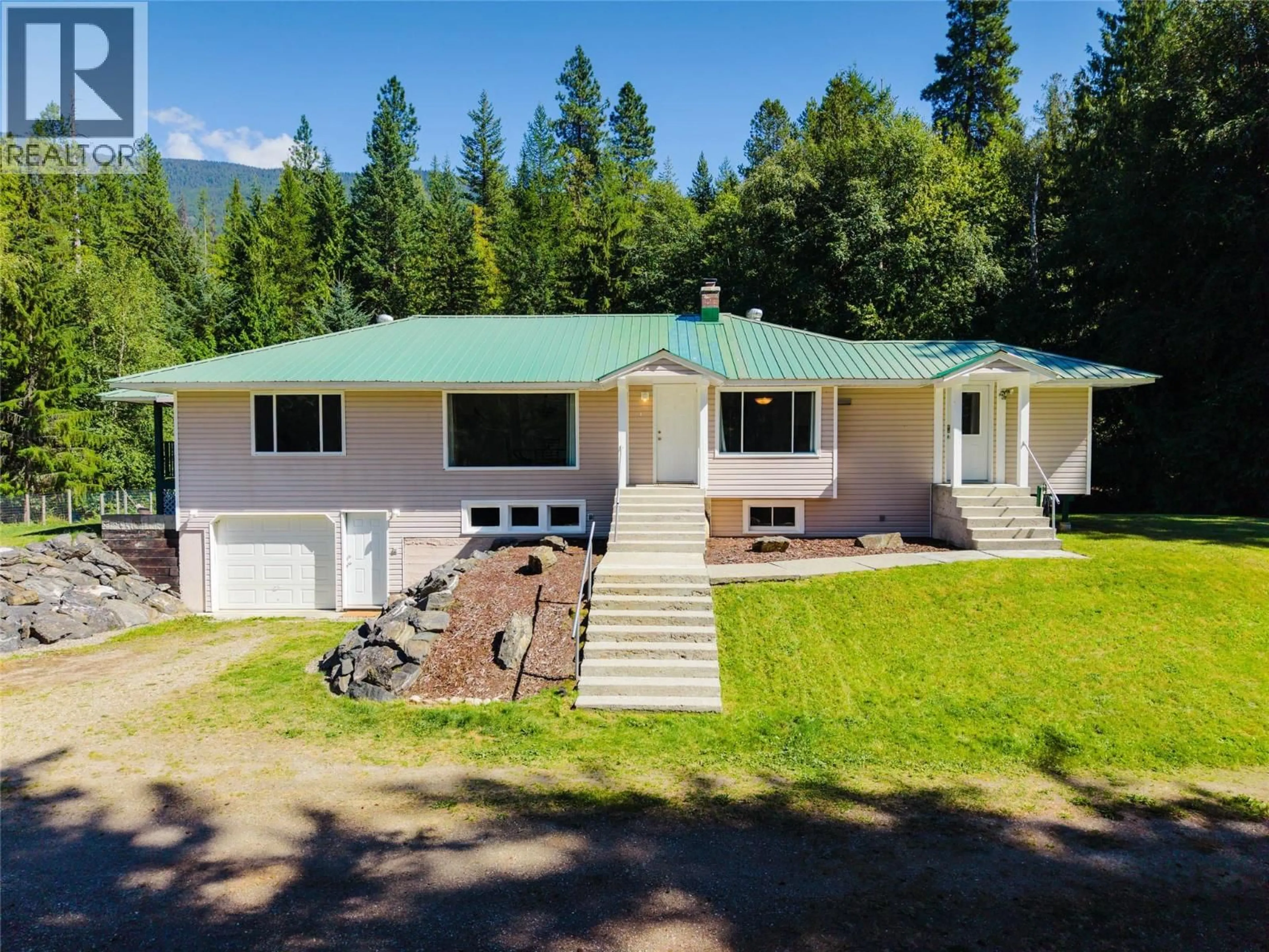 A pic from outside/outdoor area/front of a property/back of a property/a pic from drone, mountain view for 852 RIONDEL ROAD, Riondel British Columbia V0B1X0