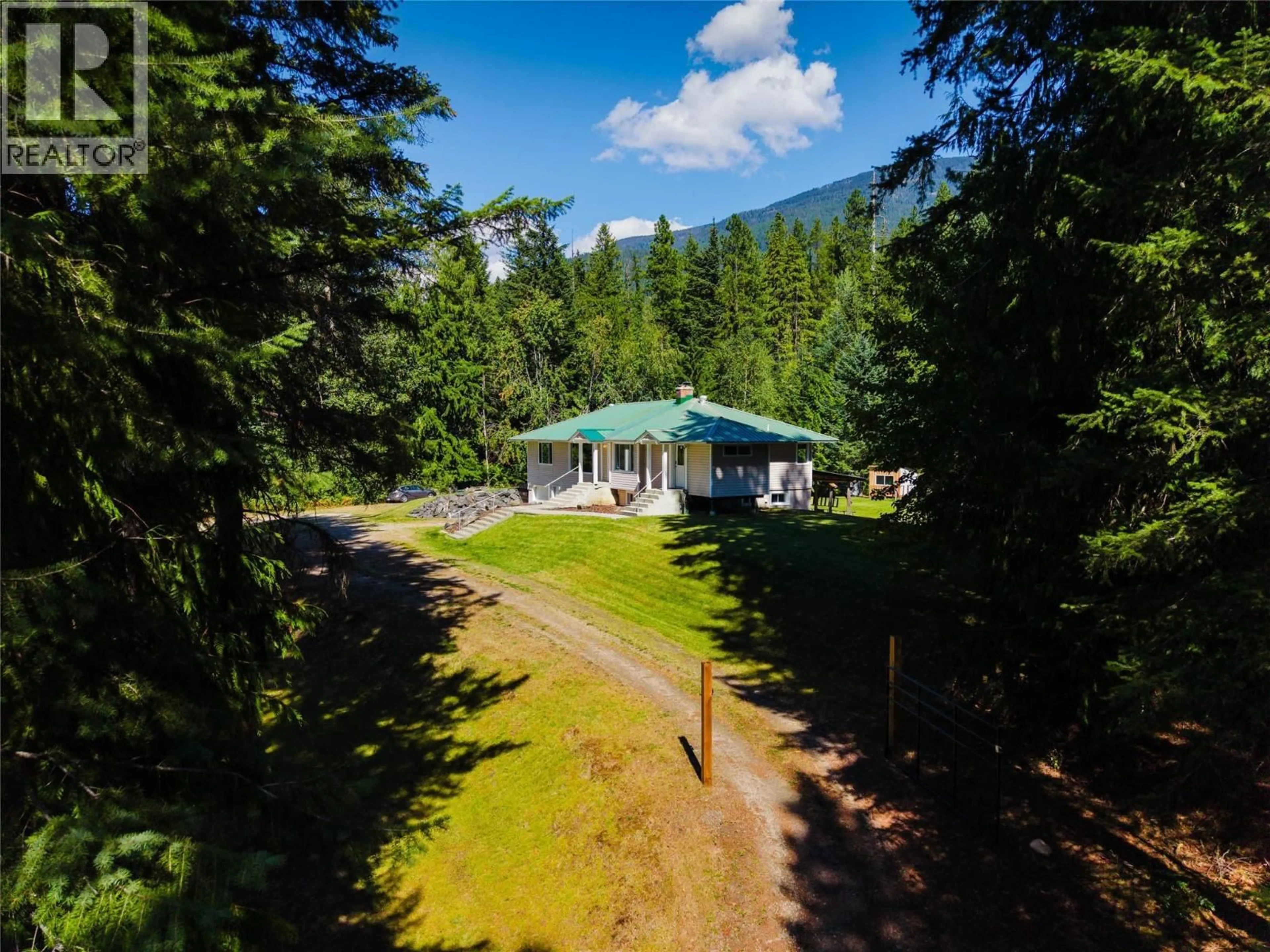 A pic from outside/outdoor area/front of a property/back of a property/a pic from drone, forest/trees view for 852 RIONDEL ROAD, Riondel British Columbia V0B1X0
