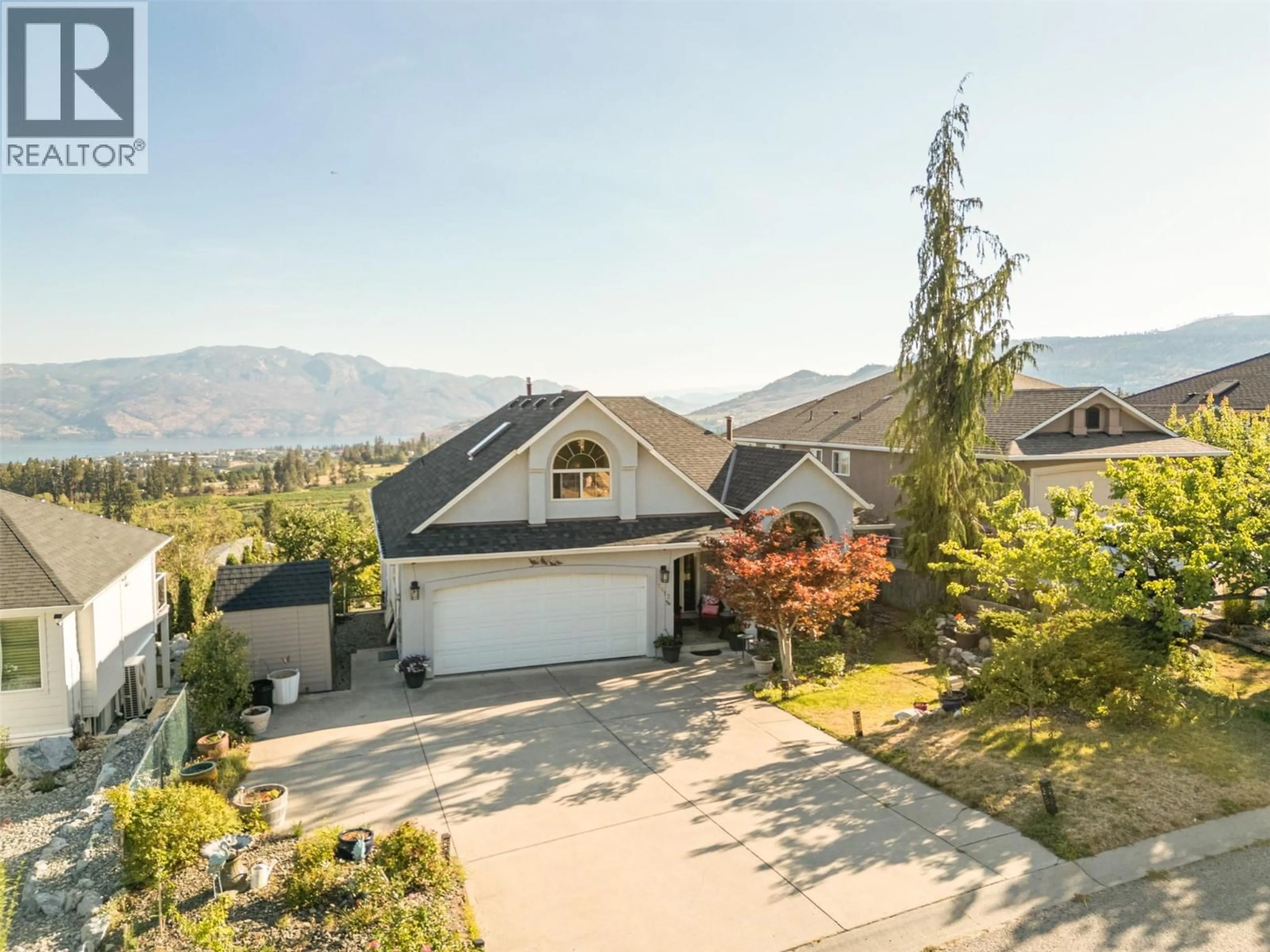 A pic from outside/outdoor area/front of a property/back of a property/a pic from drone, mountain view for 2613 COPPER RIDGE DRIVE, West Kelowna British Columbia V4T2M8
