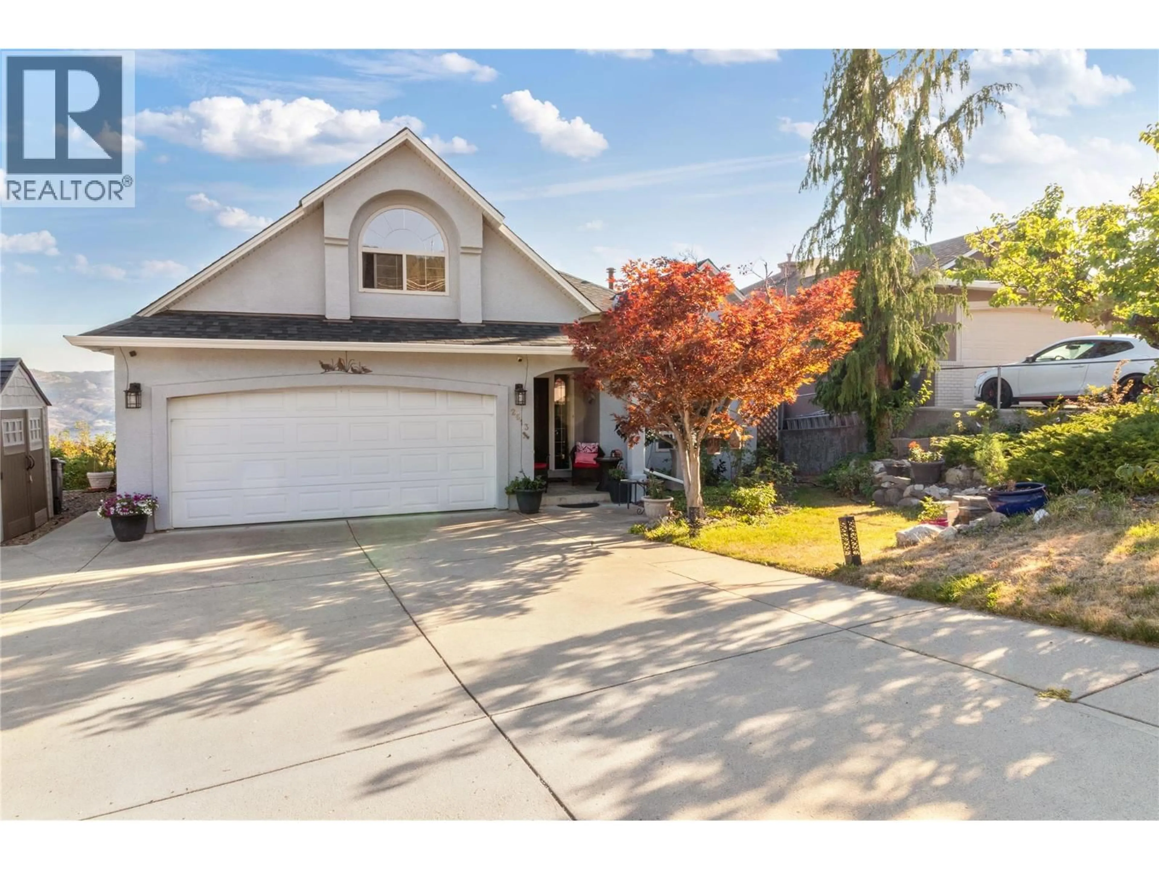 Home with vinyl exterior material, street for 2613 COPPER RIDGE DRIVE, West Kelowna British Columbia V4T2M8
