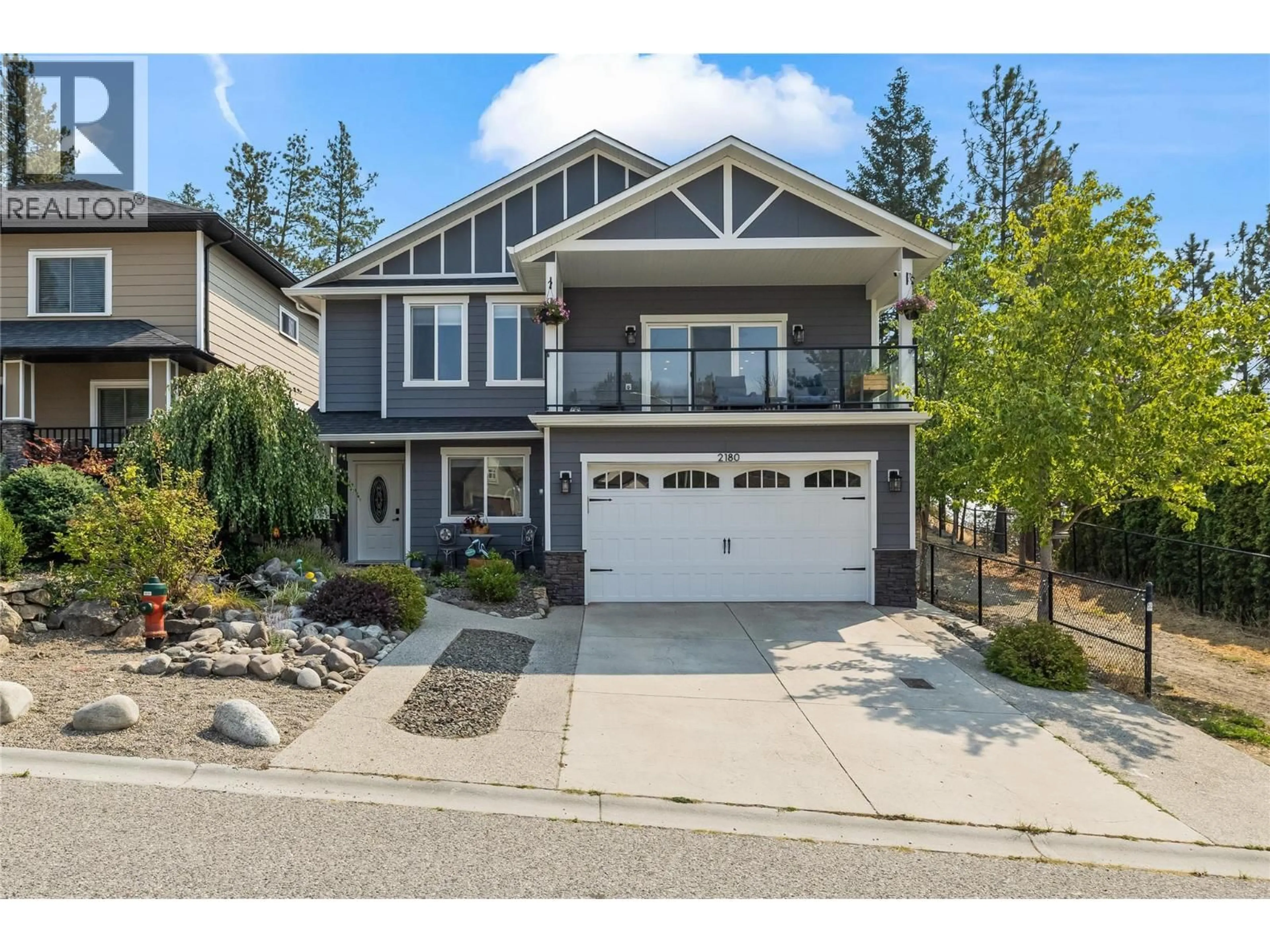 Home with vinyl exterior material, street for 2180 SUNVIEW DRIVE, West Kelowna British Columbia V1Z3X9