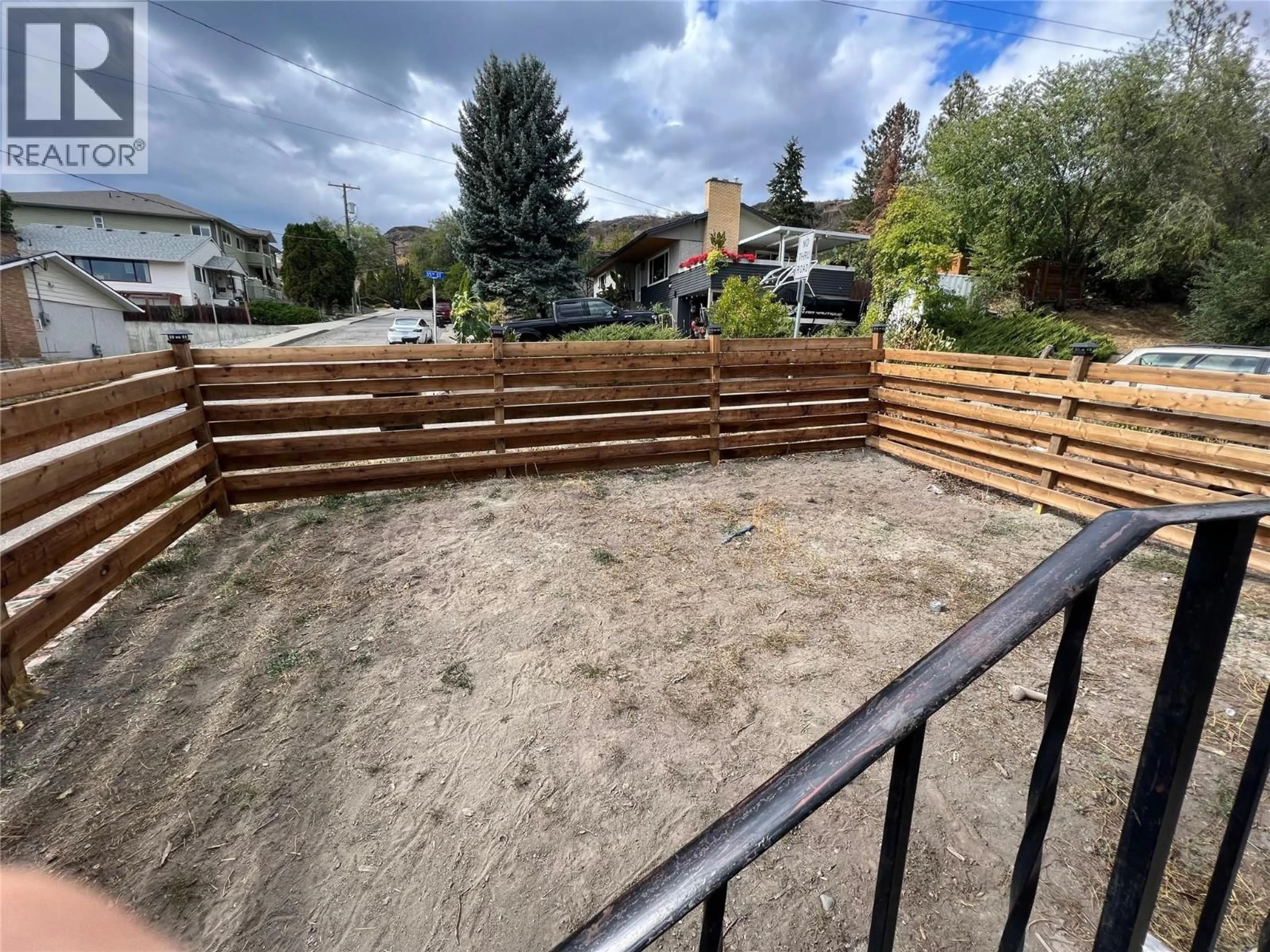 A pic from outside/outdoor area/front of a property/back of a property/a pic from drone, street for 3503 35 STREET, Vernon British Columbia V1T6C2
