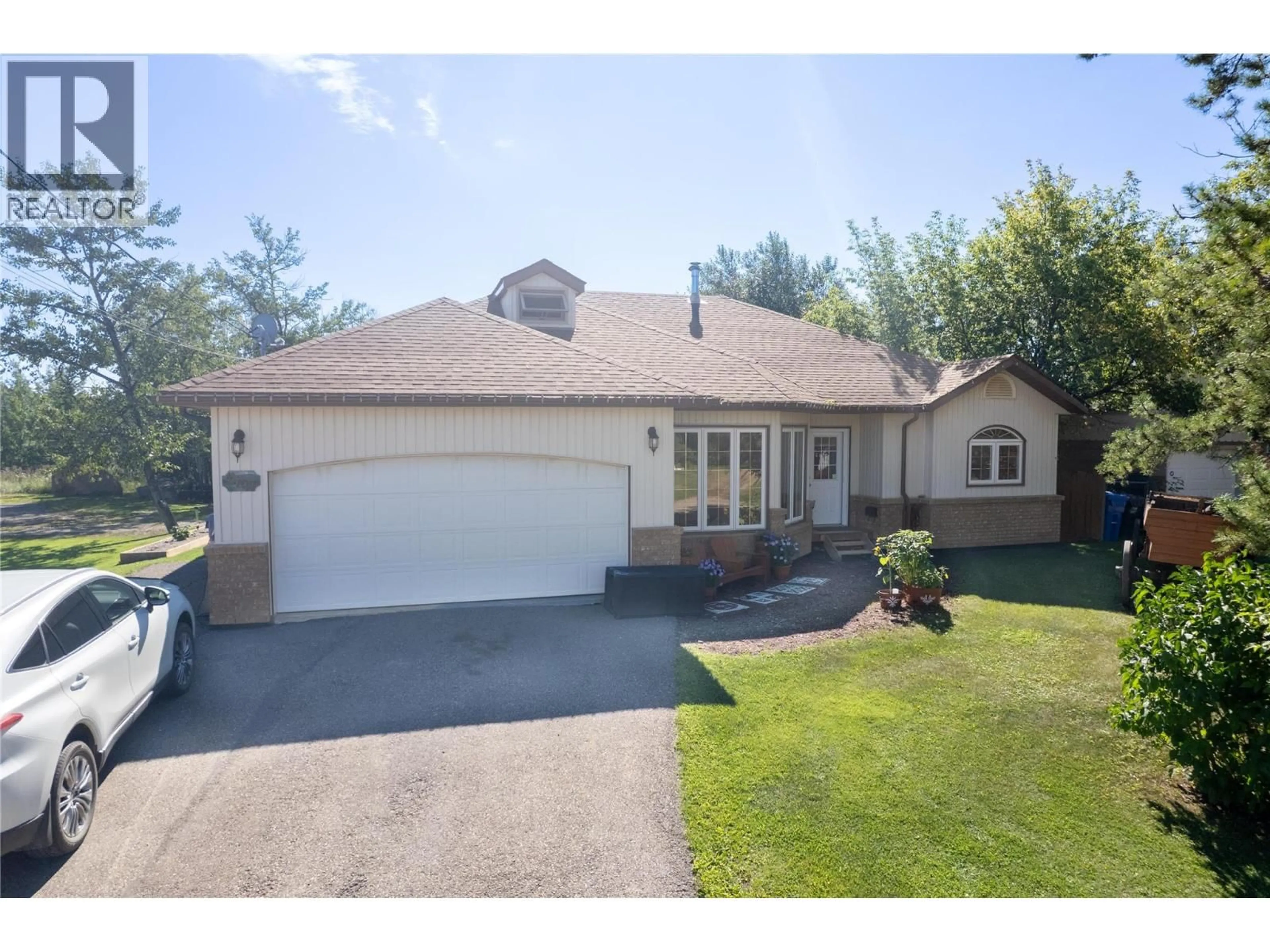 Home with vinyl exterior material, street for 4707 51 STREET, Pouce Coupe British Columbia V0C2C0