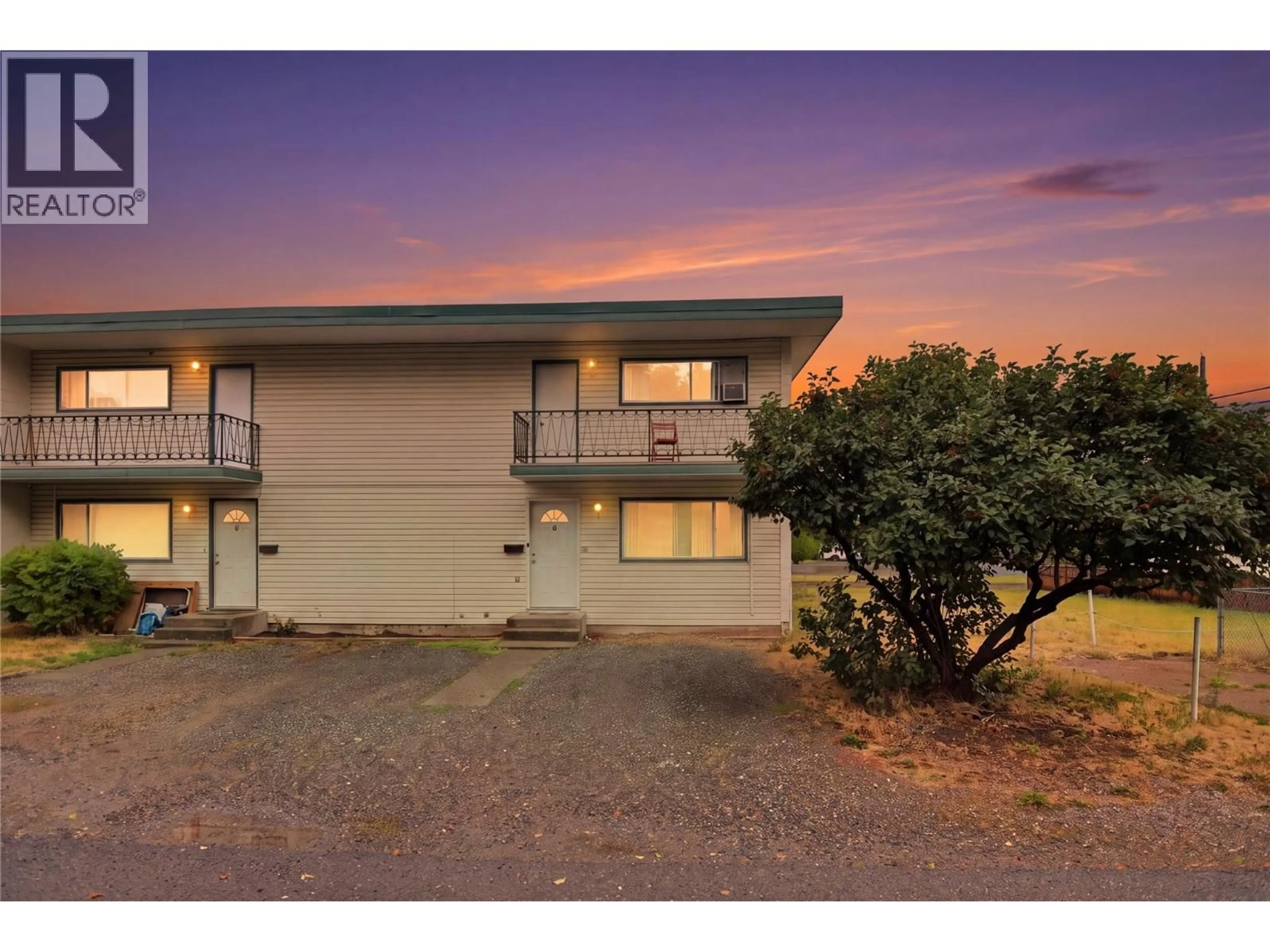 A pic from outside/outdoor area/front of a property/back of a property/a pic from drone, street for 1 - 2505 SUNSET DRIVE, Kamloops British Columbia V2C4K1