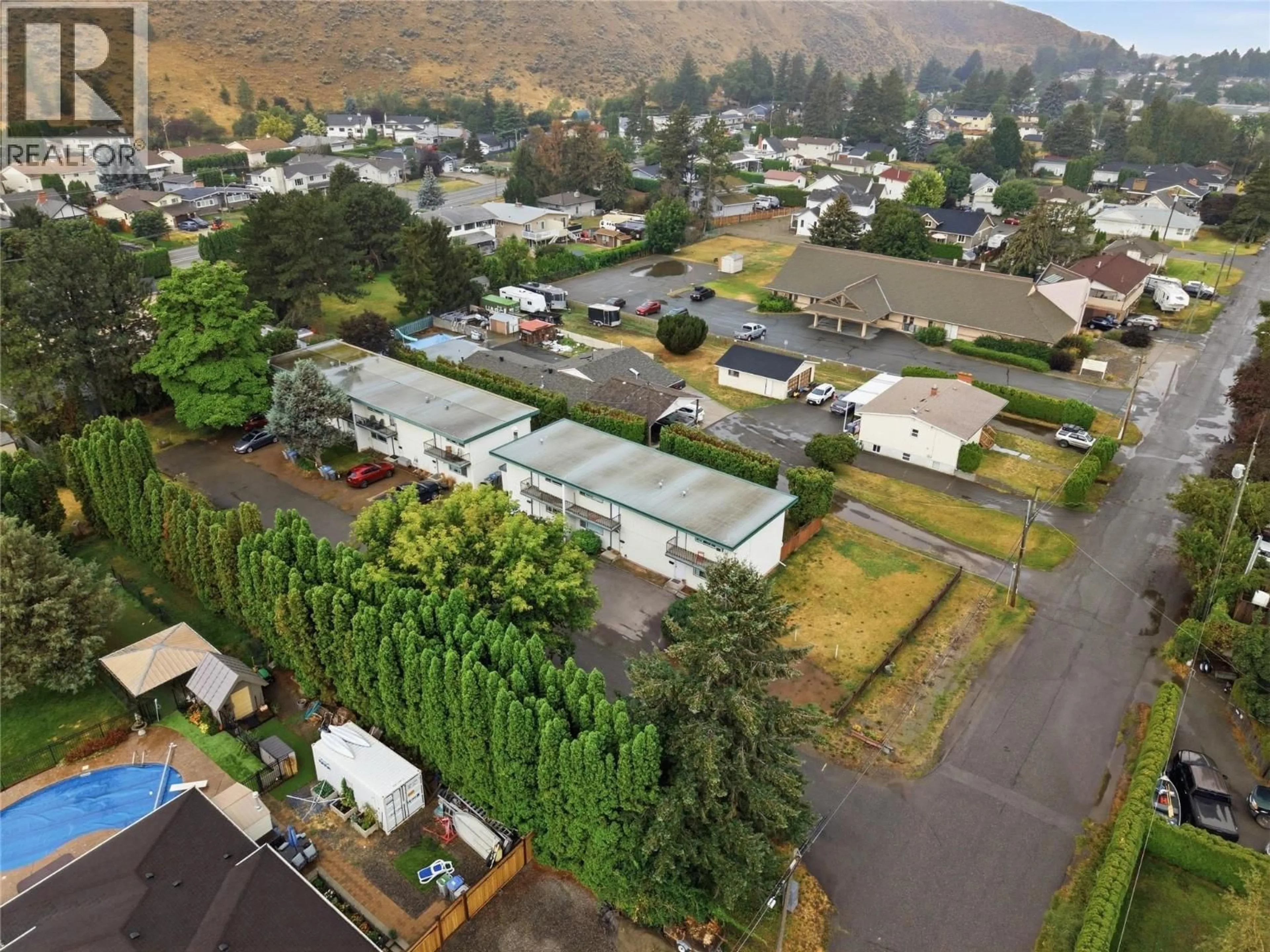 A pic from outside/outdoor area/front of a property/back of a property/a pic from drone, mountain view for 1 - 2505 SUNSET DRIVE, Kamloops British Columbia V2C4K1