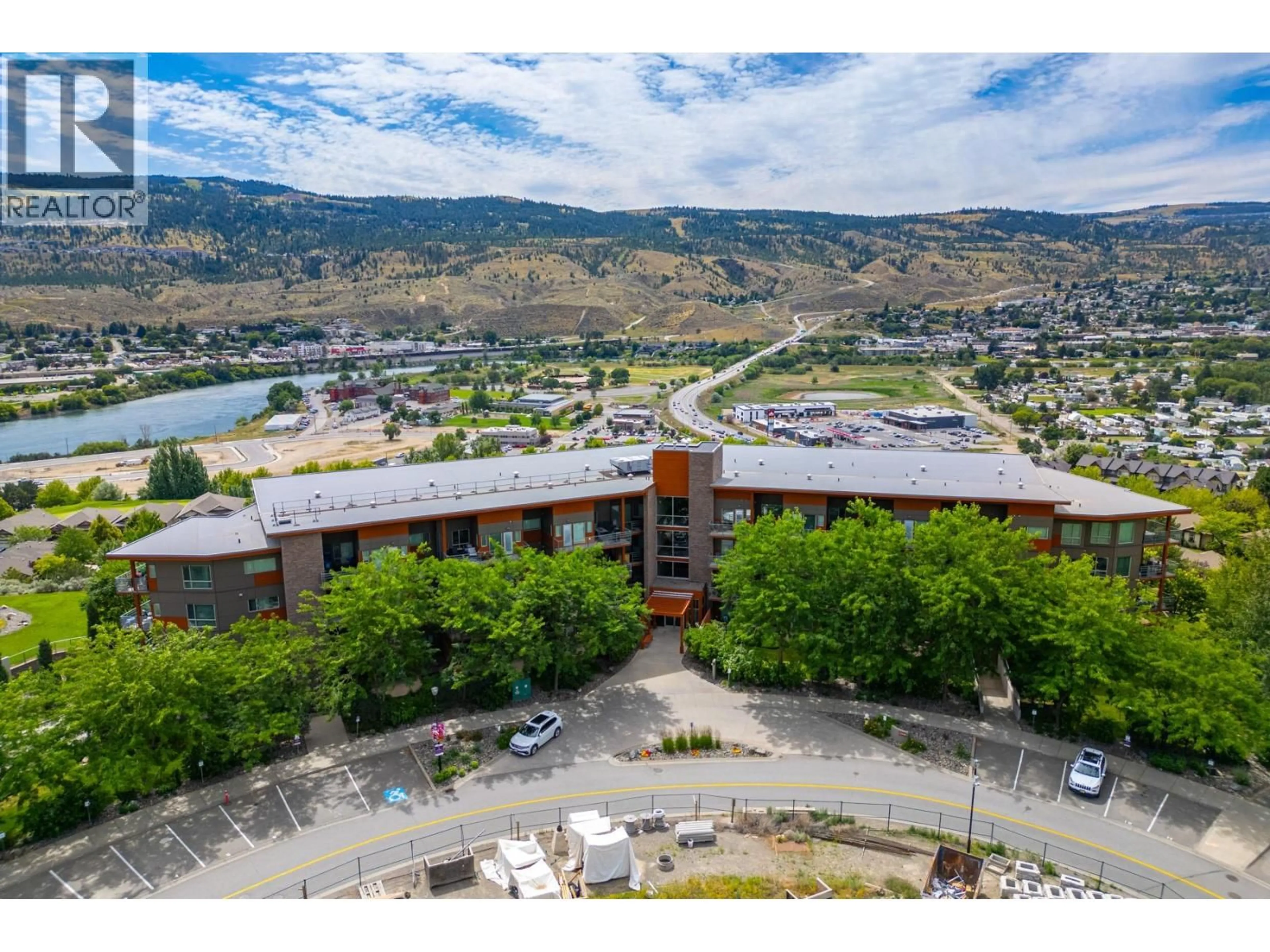 A pic from outside/outdoor area/front of a property/back of a property/a pic from drone, mountain view for 2213 - 1030 TALASA WAY, Kamloops British Columbia V2H0C3