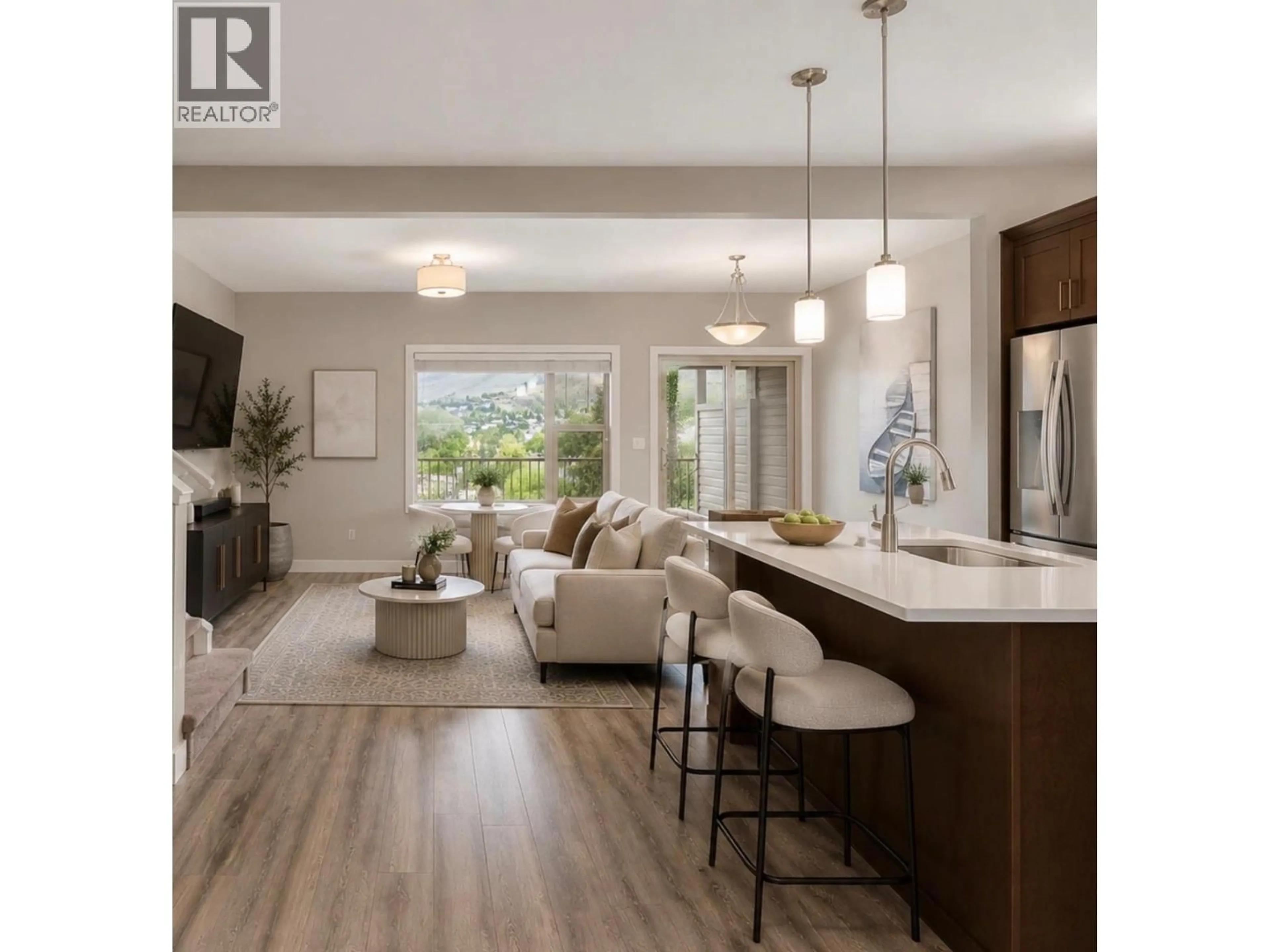 Open concept kitchen, wood/laminate floor for 5 - 4700 OKANAGAN AVENUE, Vernon British Columbia V1T9Y7