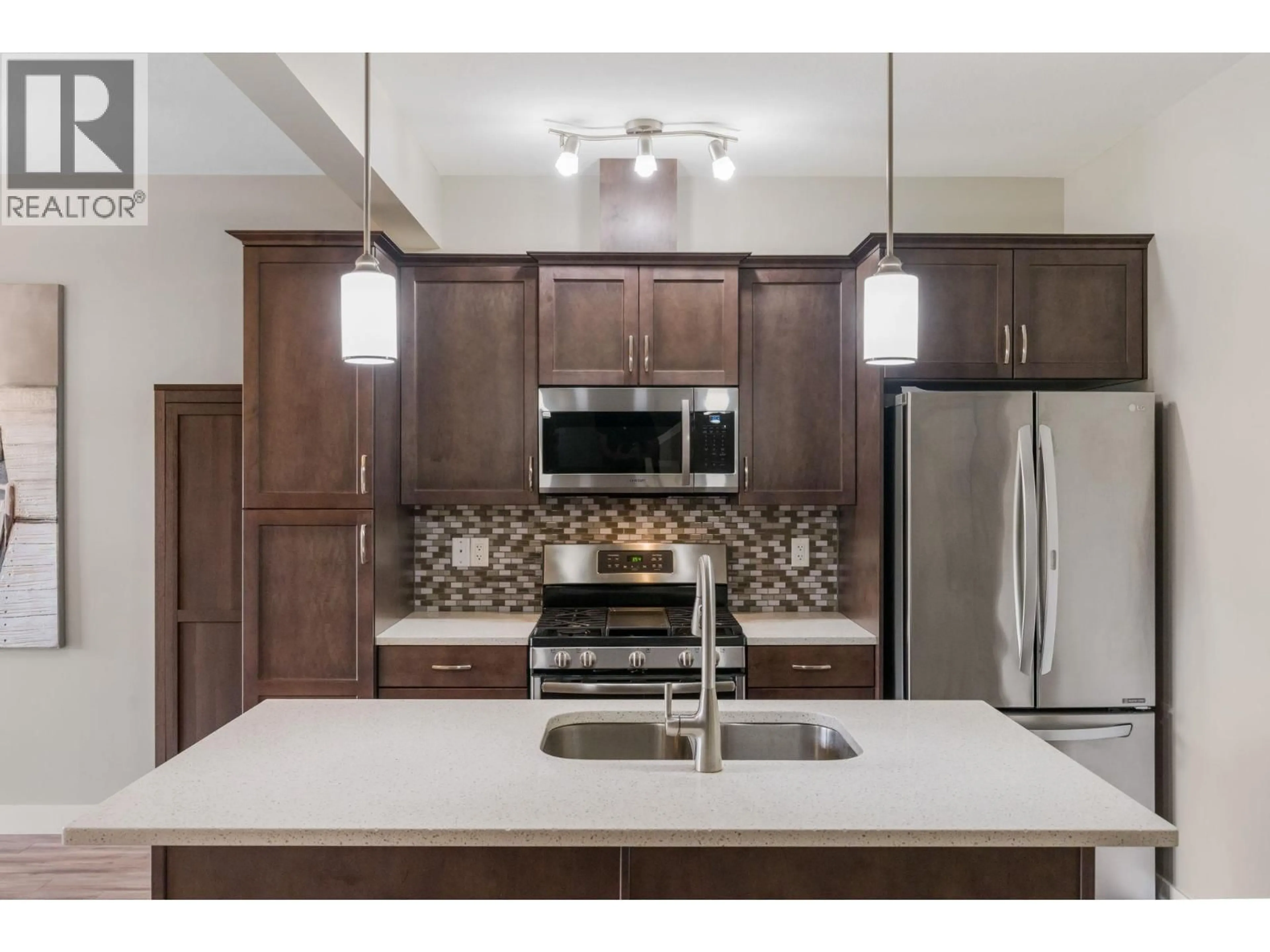 Open concept kitchen, ceramic/tile floor for 5 - 4700 OKANAGAN AVENUE, Vernon British Columbia V1T9Y7