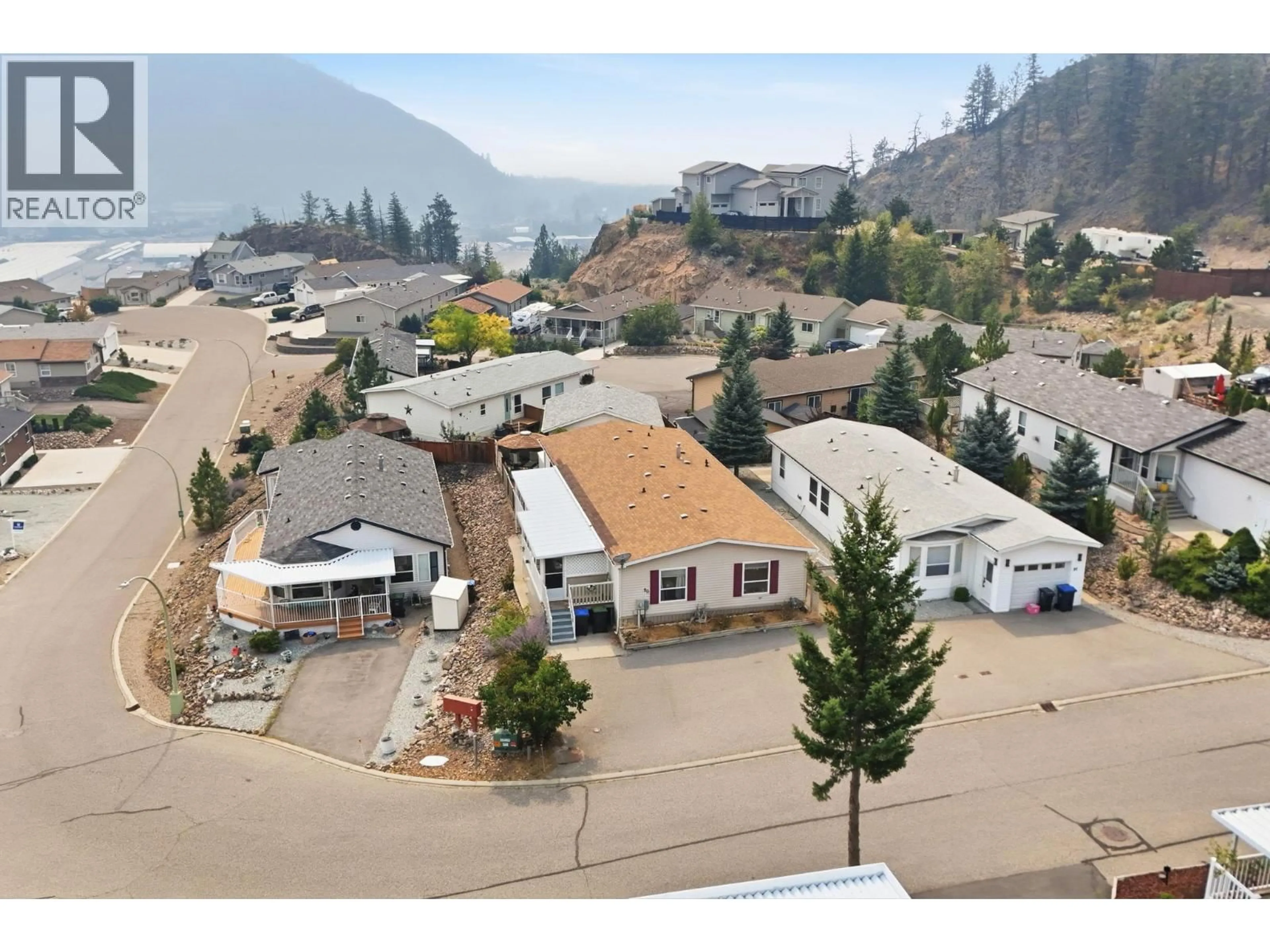 A pic from outside/outdoor area/front of a property/back of a property/a pic from drone, mountain view for 90 - 1750 LENZ ROAD, West Kelowna British Columbia V1Z3N1