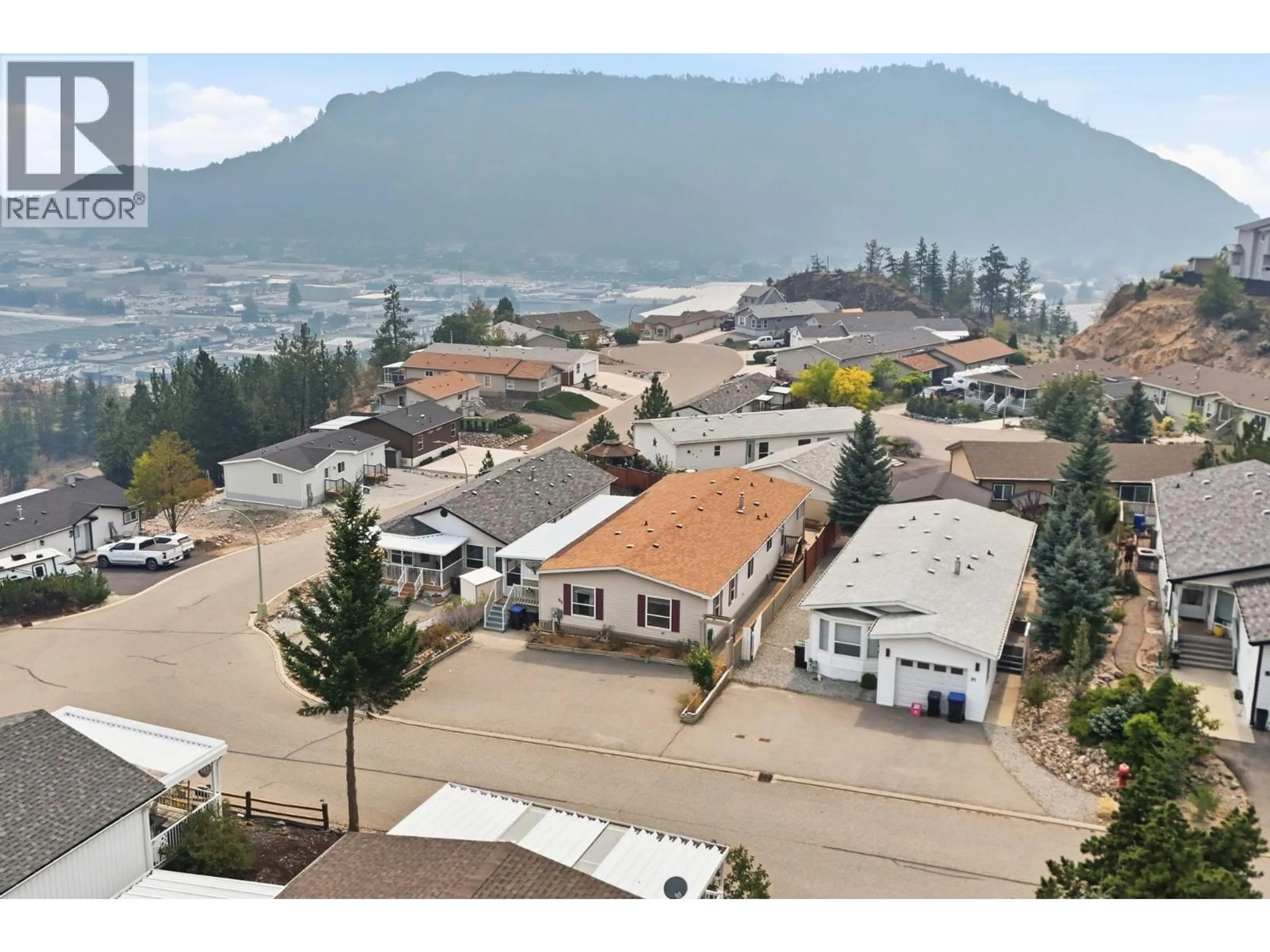 A pic from outside/outdoor area/front of a property/back of a property/a pic from drone, mountain view for 90 - 1750 LENZ ROAD, West Kelowna British Columbia V1Z3N1