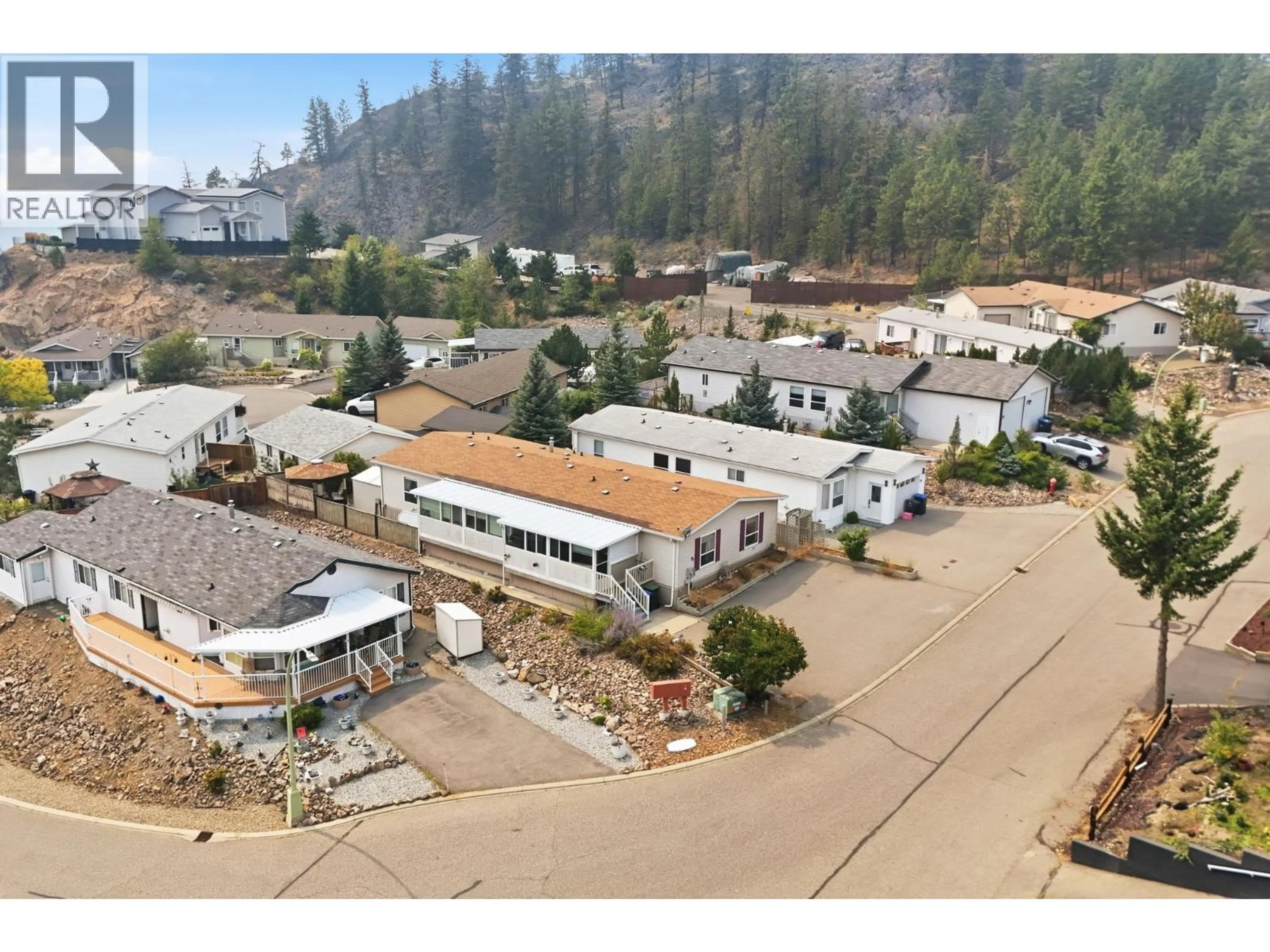 A pic from outside/outdoor area/front of a property/back of a property/a pic from drone, mountain view for 90 - 1750 LENZ ROAD, West Kelowna British Columbia V1Z3N1
