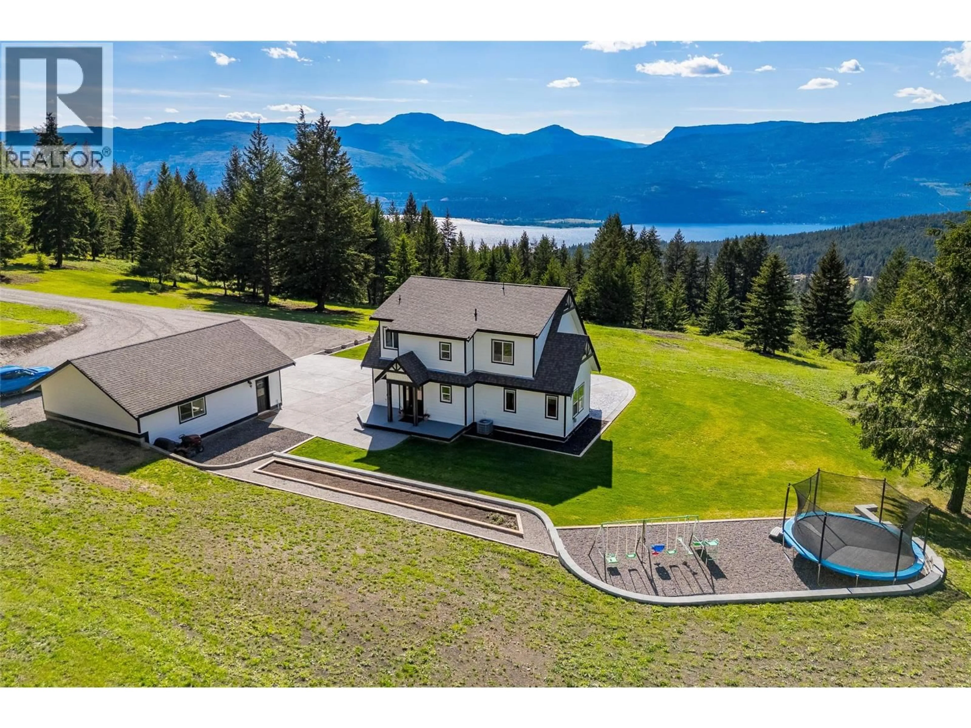 A pic from outside/outdoor area/front of a property/back of a property/a pic from drone, mountain view for 17936 ANGUS ROAD, Lake Country British Columbia V4V1B6