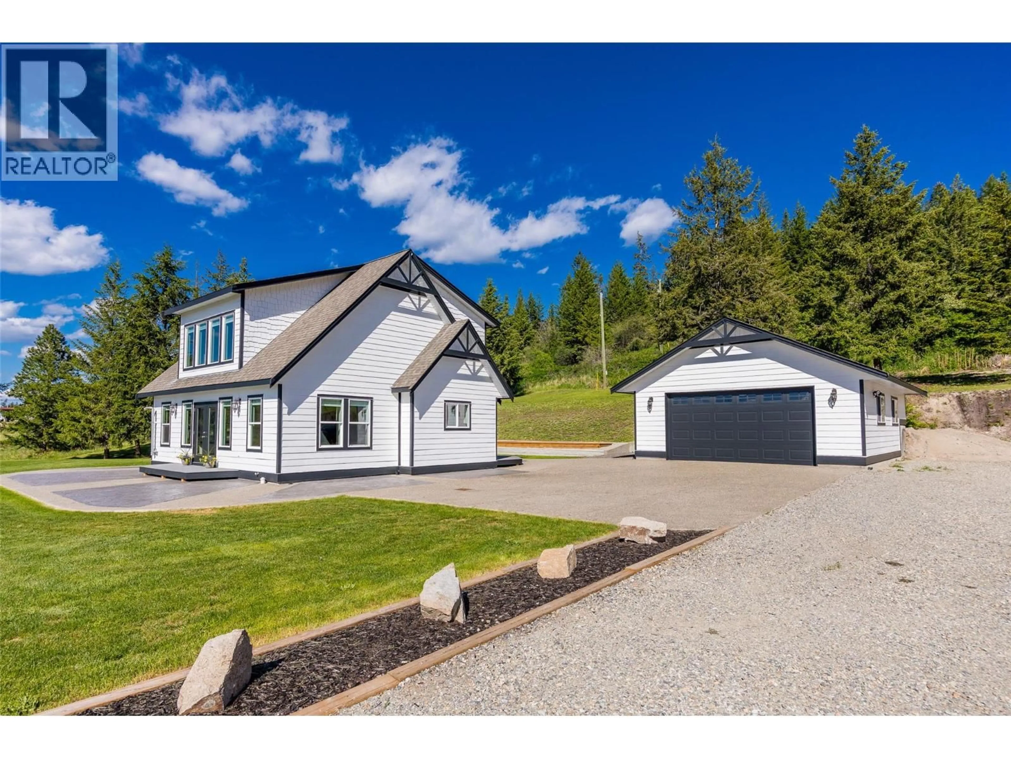 A pic from outside/outdoor area/front of a property/back of a property/a pic from drone, street for 17936 ANGUS ROAD, Lake Country British Columbia V4V1B6