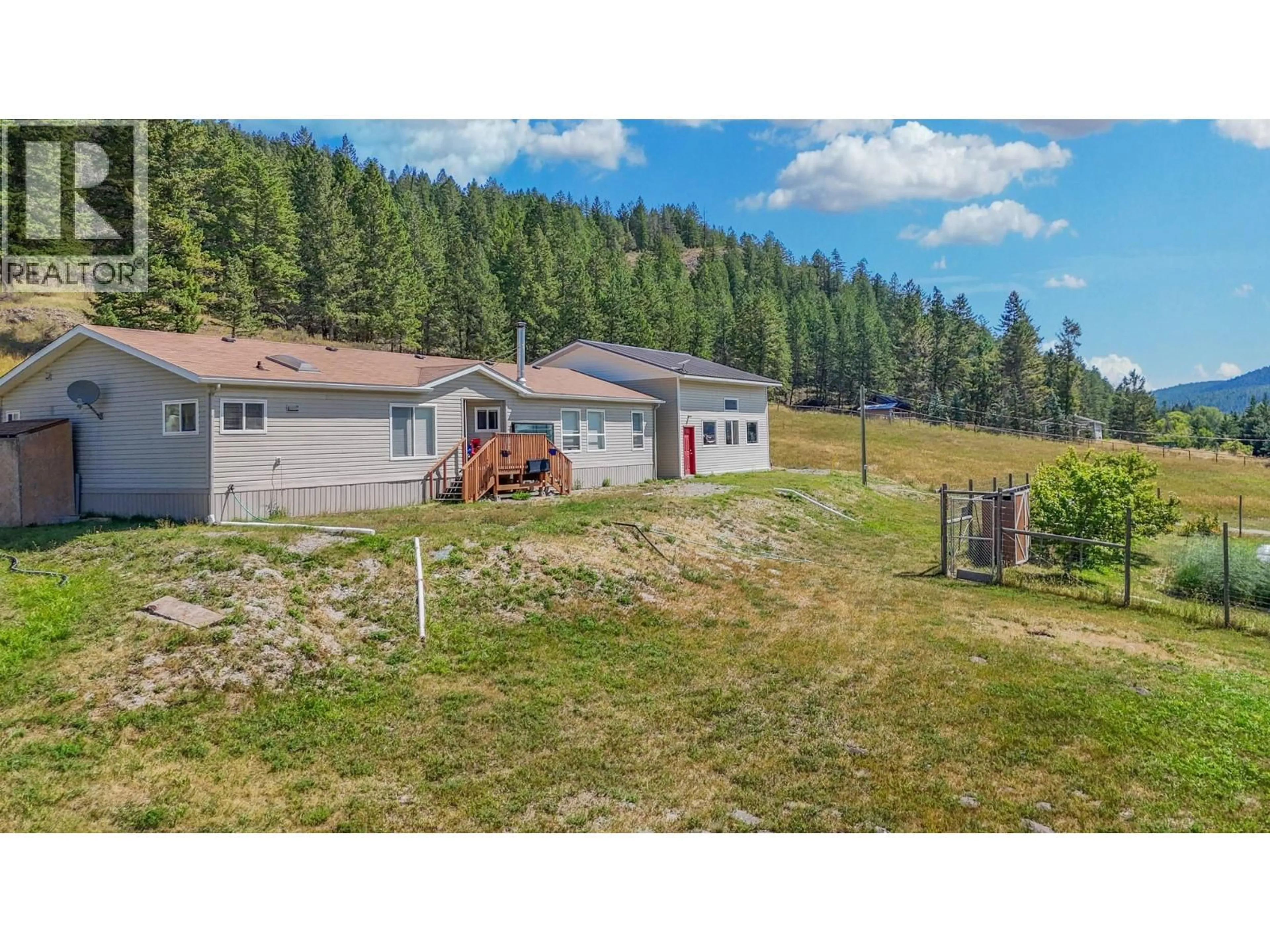 A pic from outside/outdoor area/front of a property/back of a property/a pic from drone, mountain view for 5562 HA HA CREEK ROAD, Wardner British Columbia V0B2J0