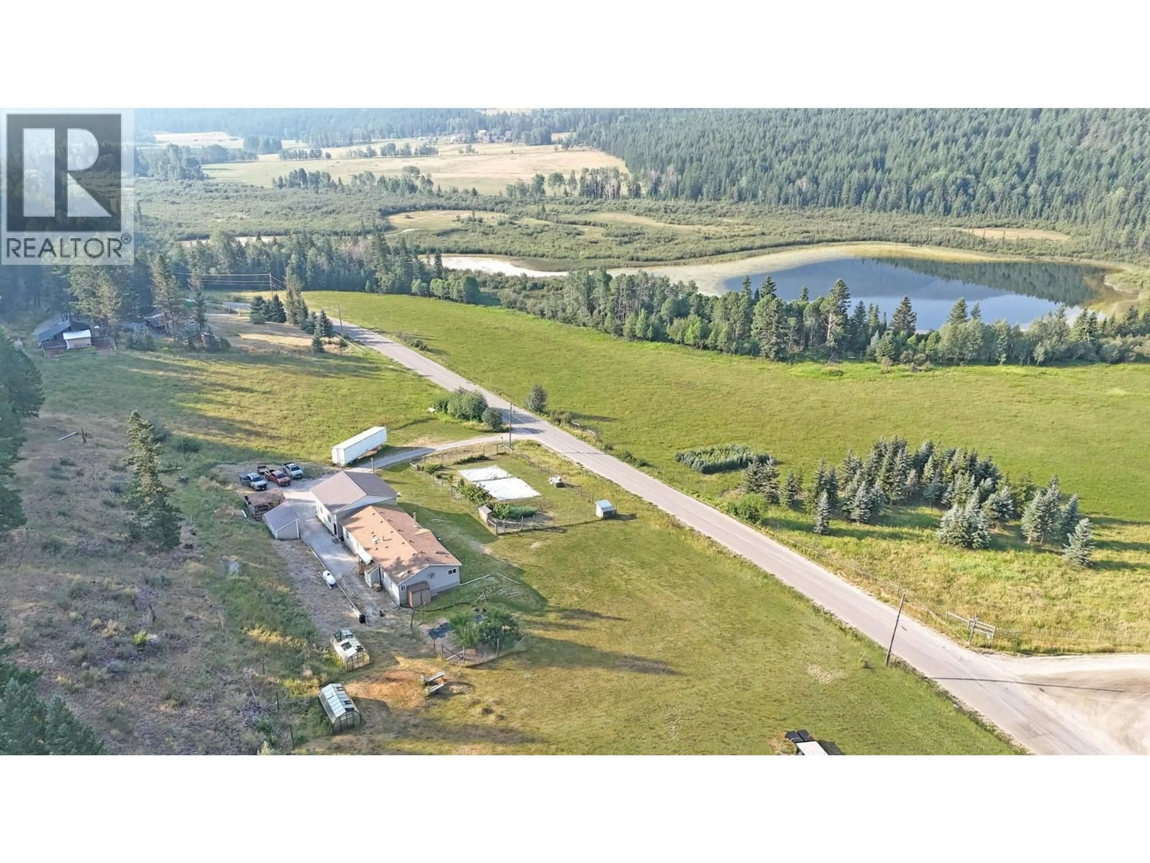 A pic from outside/outdoor area/front of a property/back of a property/a pic from drone, unknown for 5562 HA HA CREEK ROAD, Wardner British Columbia V0B2J0