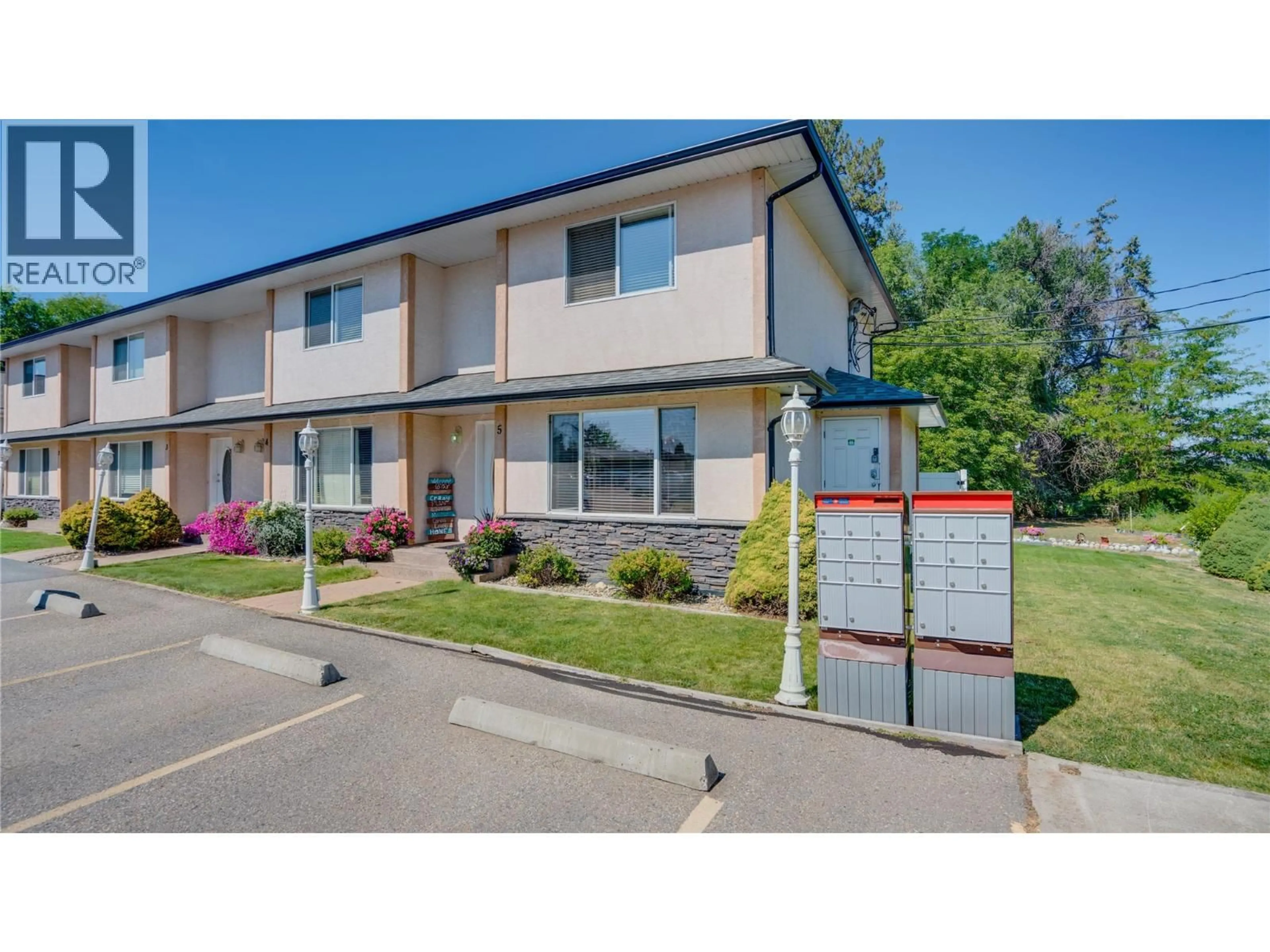A pic from outside/outdoor area/front of a property/back of a property/a pic from drone, street for 5 - 2655 PLEASANT VALLEY ROAD, Armstrong British Columbia V0E1B2