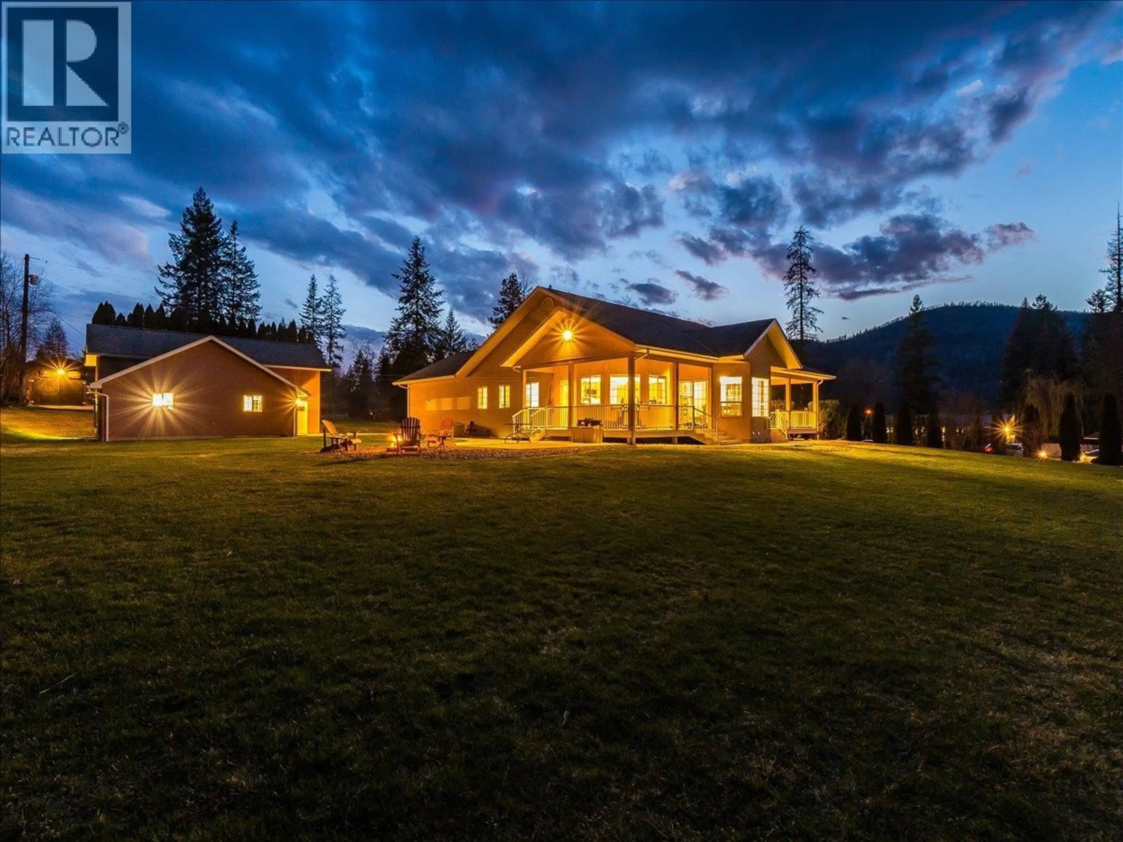 A pic from outside/outdoor area/front of a property/back of a property/a pic from drone, mountain view for 1750 GREEN ROAD, Fruitvale British Columbia V0G1L1