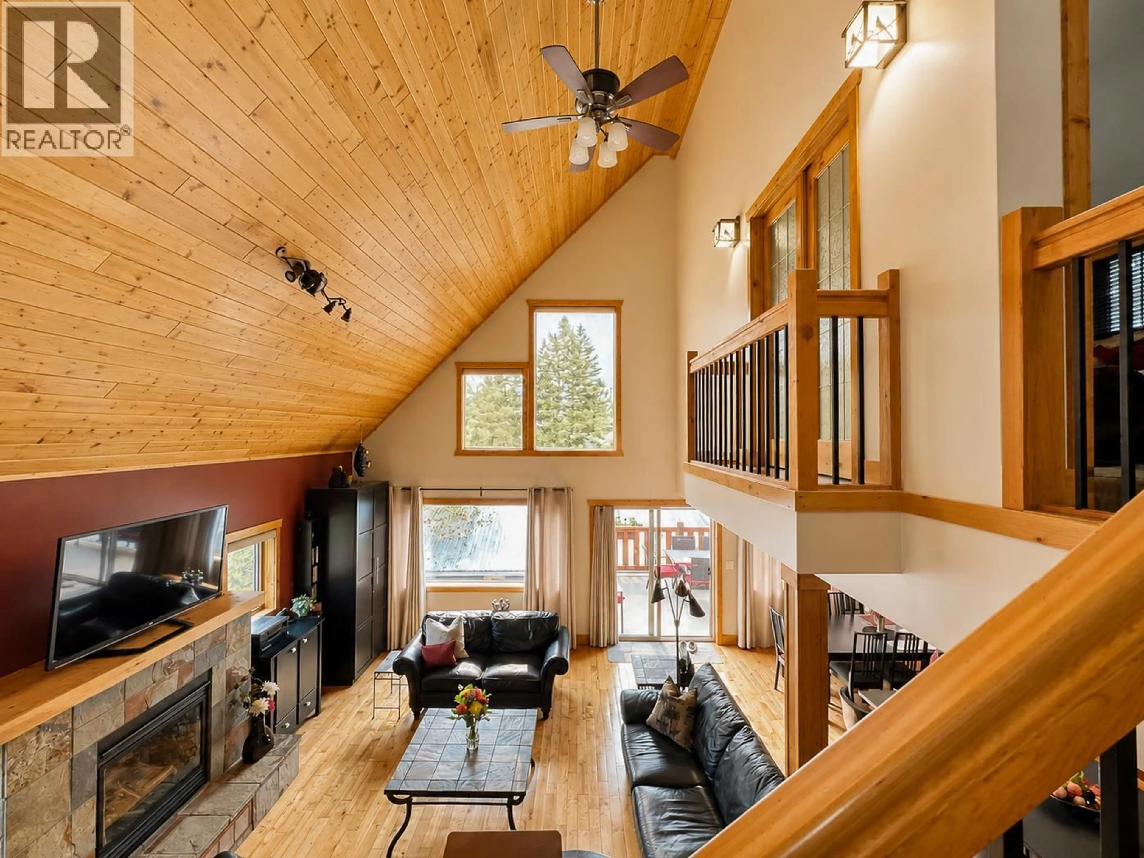 Living room with furniture, wood/laminate floor for 1741 8TH AVENUE, Invermere British Columbia V0A1K4