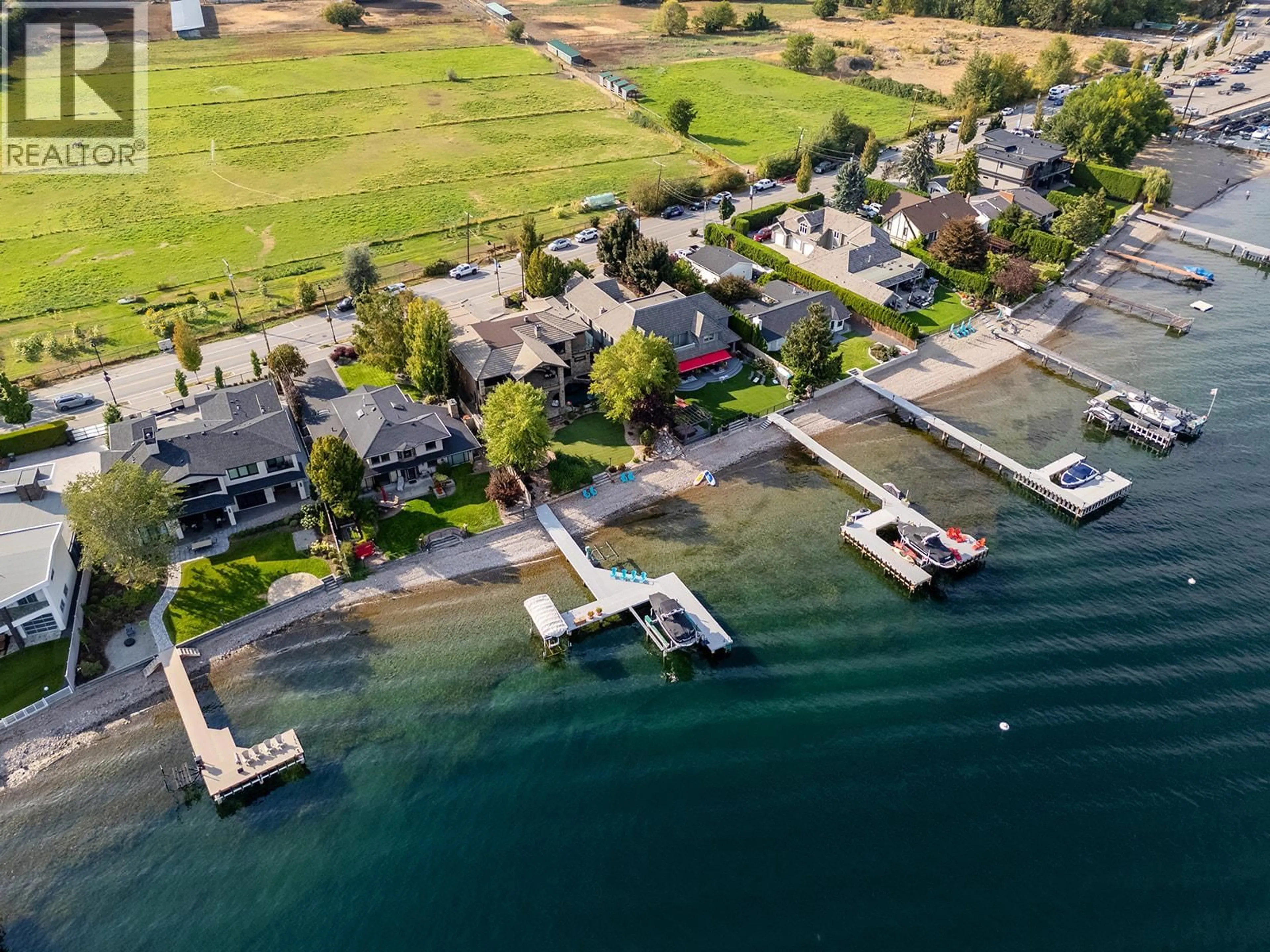 A pic from outside/outdoor area/front of a property/back of a property/a pic from drone, water/lake/river/ocean view for 4165 GELLATLY ROAD, West Kelowna British Columbia V4T2K2