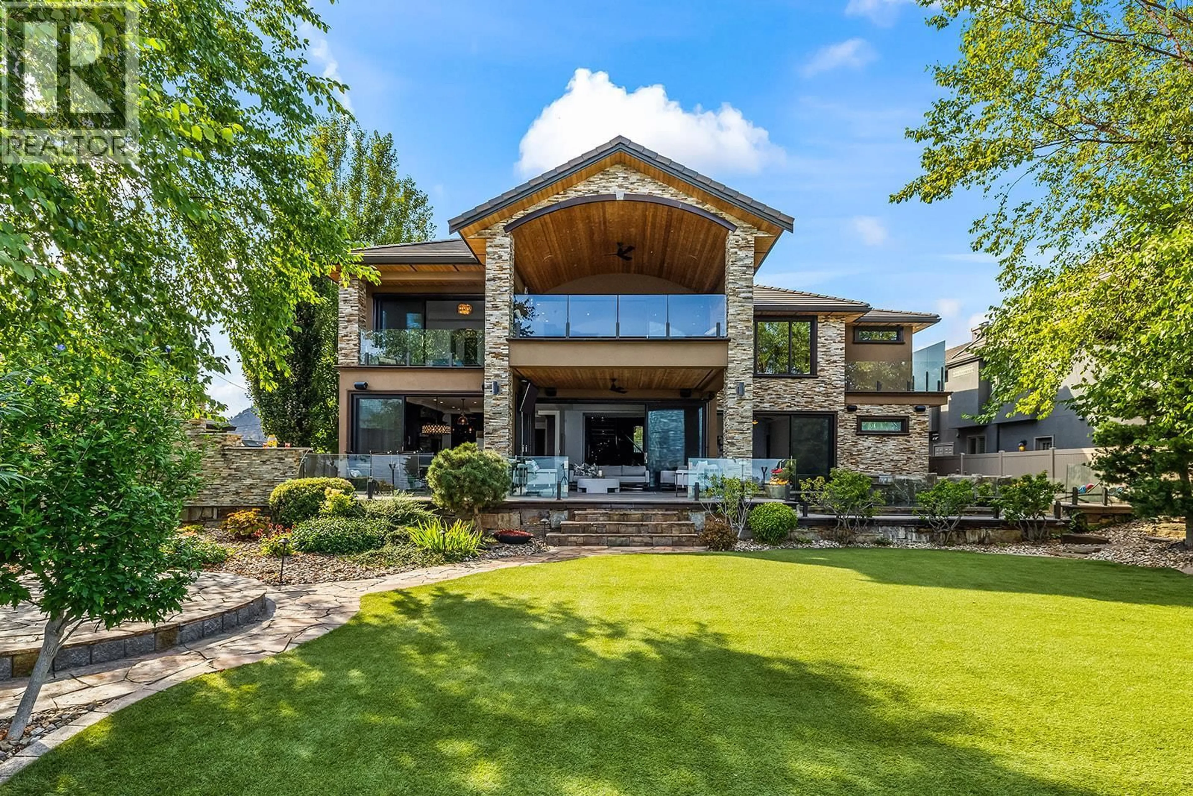 Home with brick exterior material, mountain view for 4165 GELLATLY ROAD, West Kelowna British Columbia V4T2K2