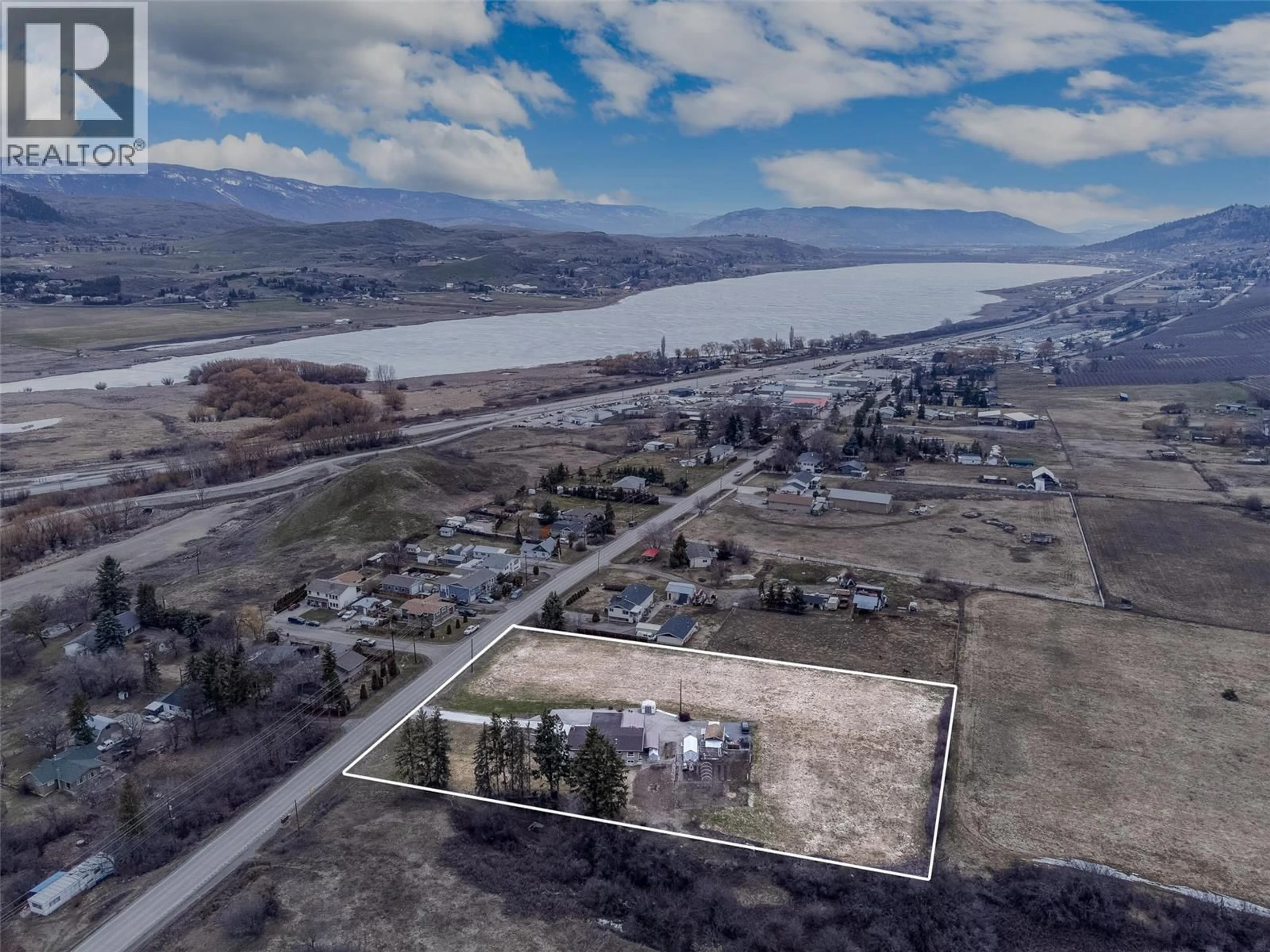 A pic from outside/outdoor area/front of a property/back of a property/a pic from drone, water/lake/river/ocean view for 5973 PLEASANT VALLEY ROAD, Vernon British Columbia V1B3L6