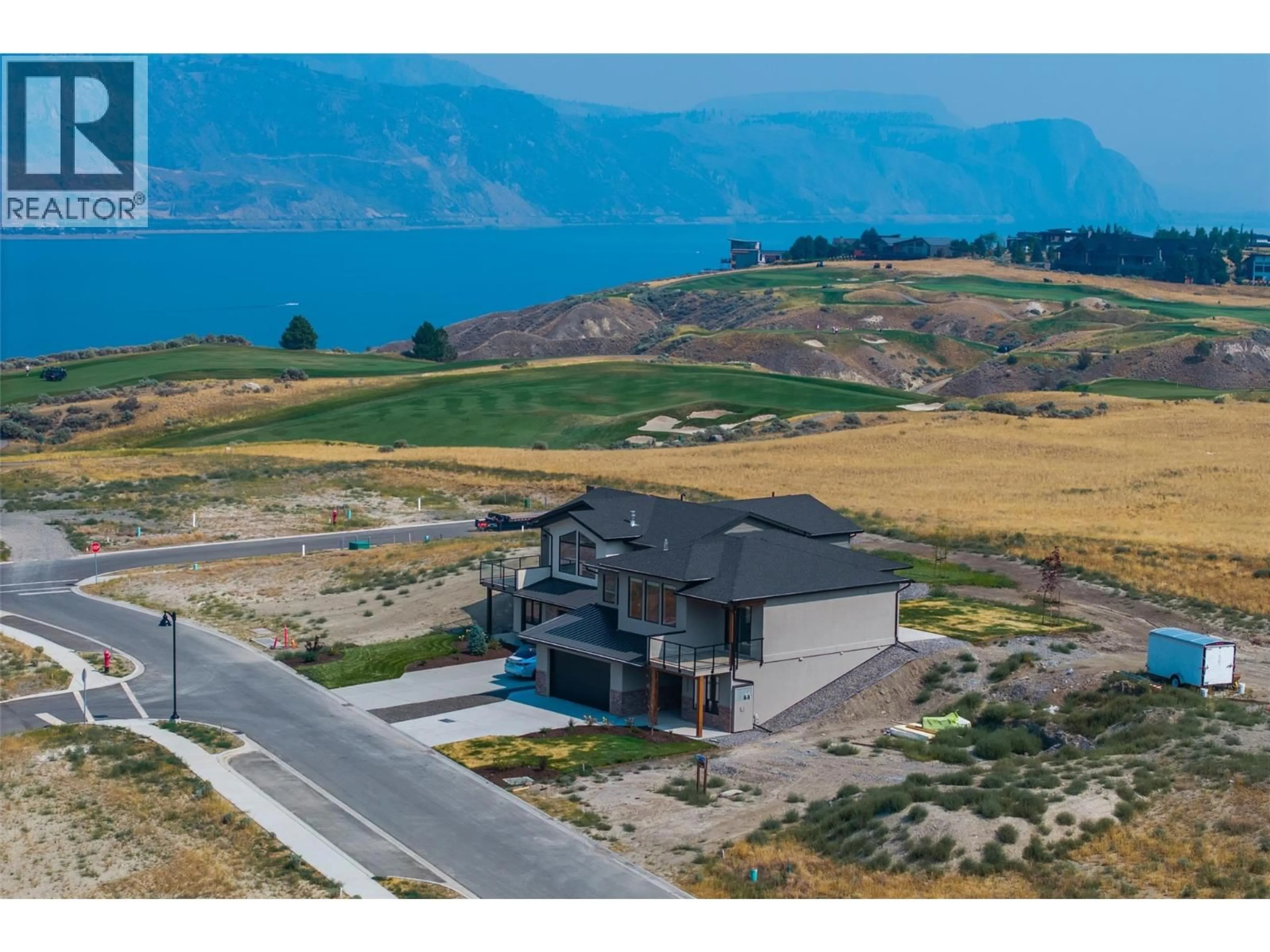 A pic from outside/outdoor area/front of a property/back of a property/a pic from drone, water/lake/river/ocean view for 111 - 38 RUE CHEVAL NOIR OTHER, Kamloops British Columbia V1S0G5