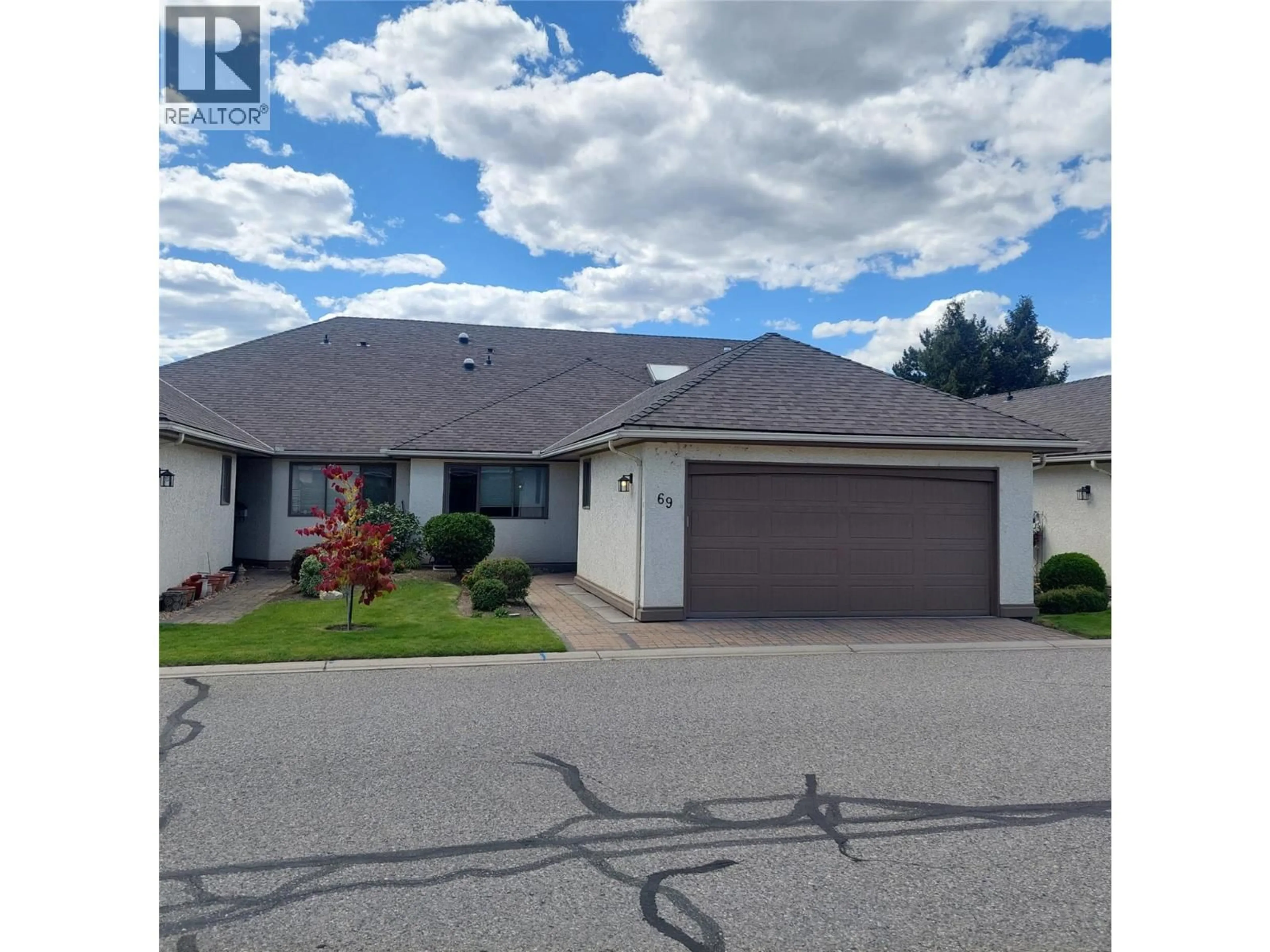 A pic from outside/outdoor area/front of a property/back of a property/a pic from drone, street for 69 - 950 LANFRANCO ROAD, Kelowna British Columbia V1W3X4