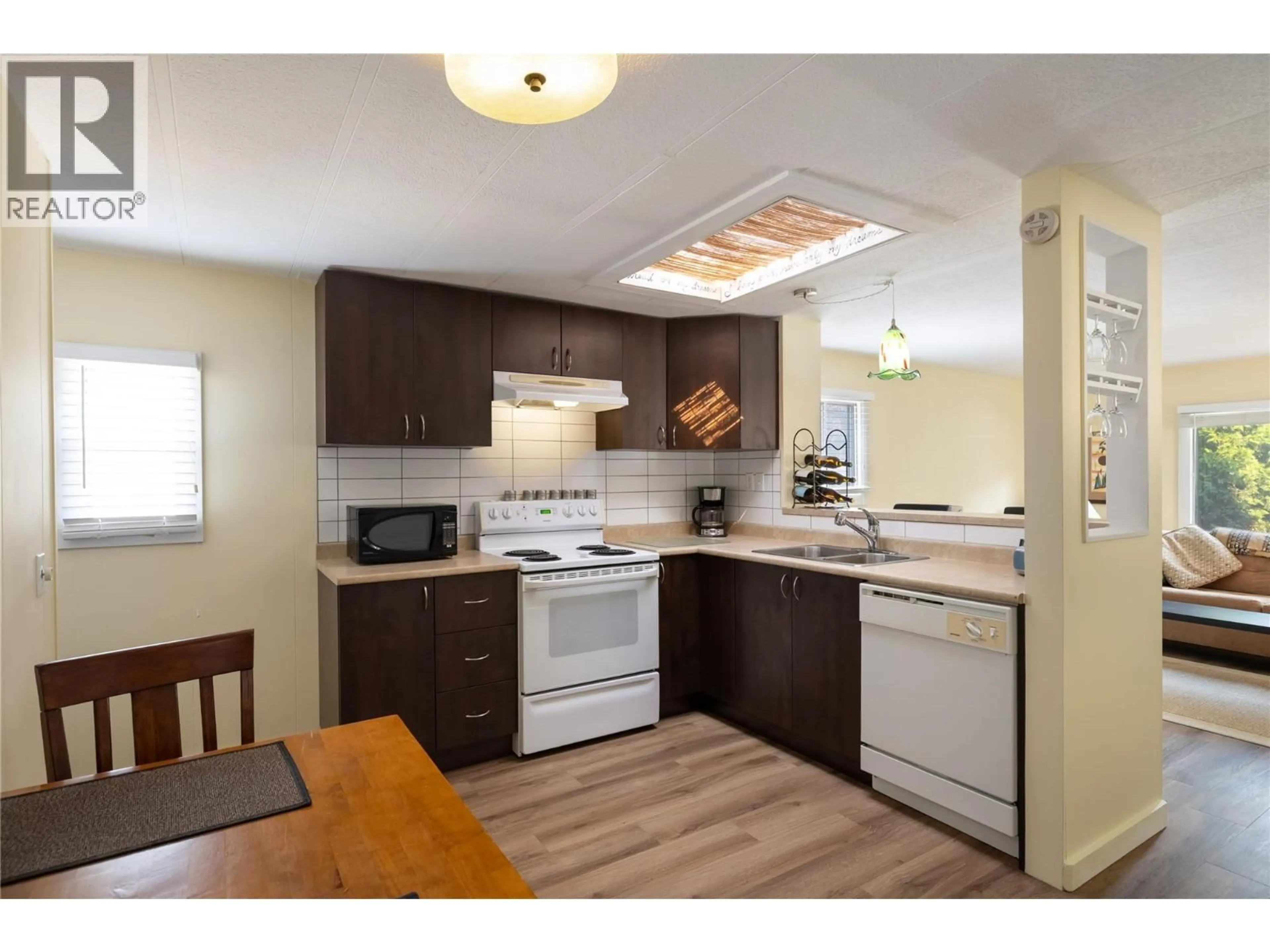 Standard kitchen, wood/laminate floor for 67 - 15401 KALAMALKA LAKE ROAD, Coldstream British Columbia V1B1Z3